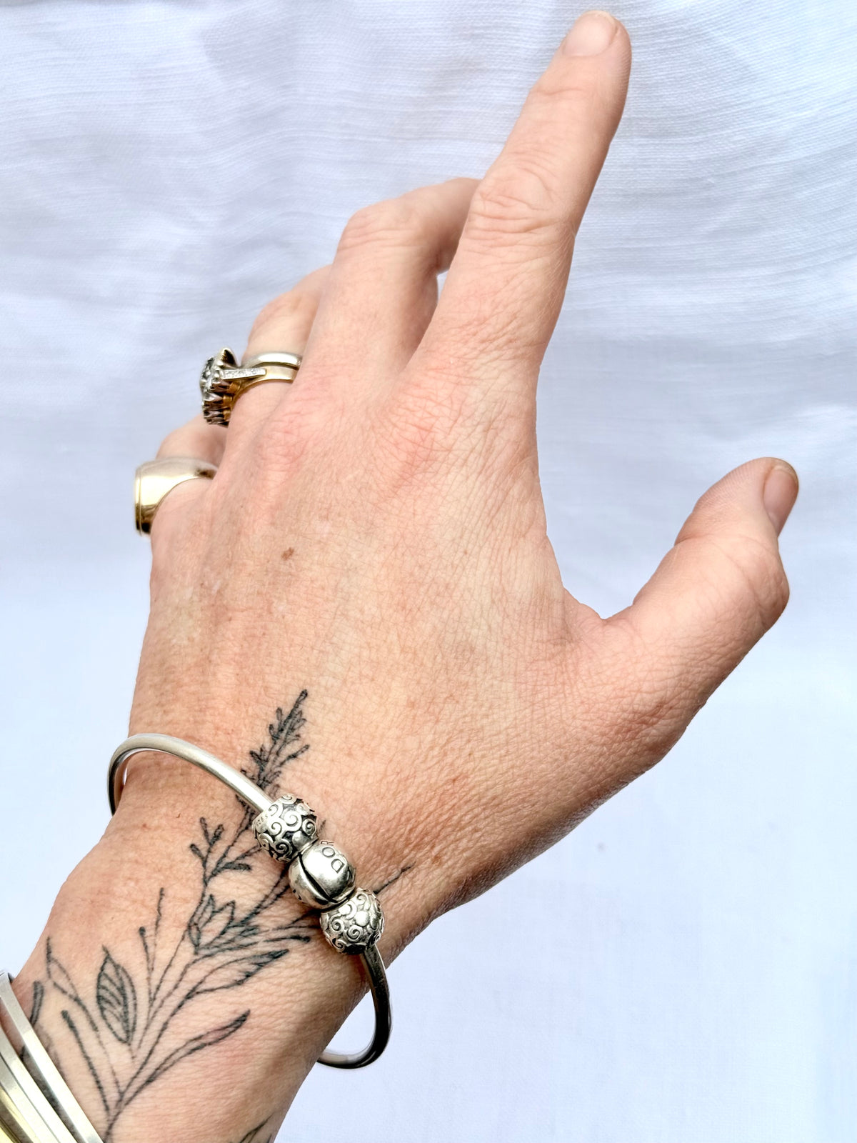 .925 signed Pandora Moments classic sterling silver ball clasp bangle with two screw on filigree form ball charms