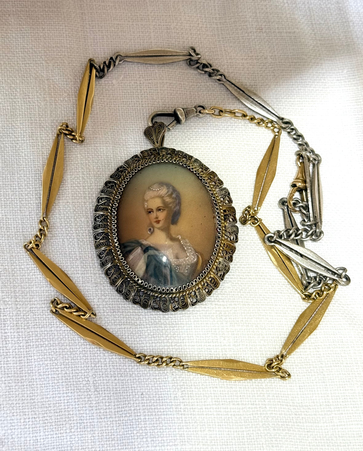 .1930s .1940s .800 Artist gold and silver incredible hand painted miniature Baroque revival portrait in fine silver filigree brooch and pendant