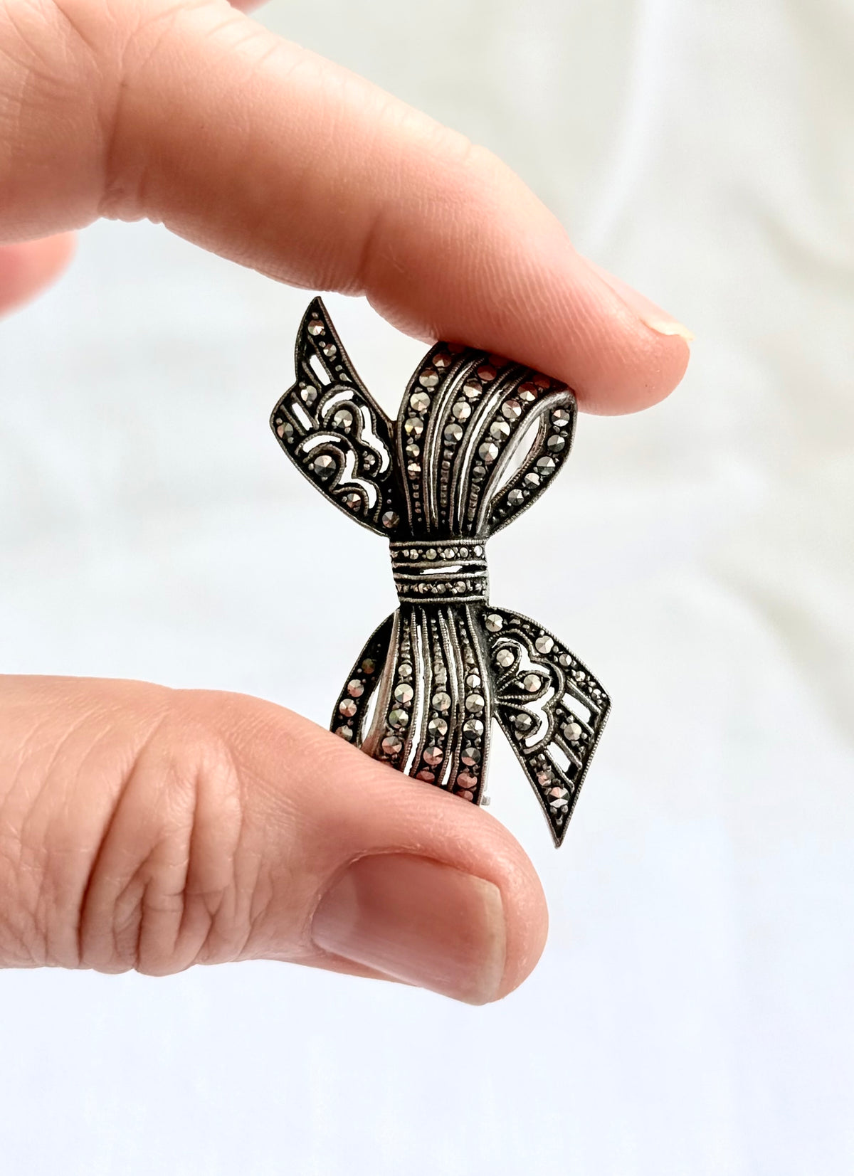 .1920s .1930s .800 Art Deco French Paris Bow Ribbon silver Marcasite gemstone sweetheart brooch