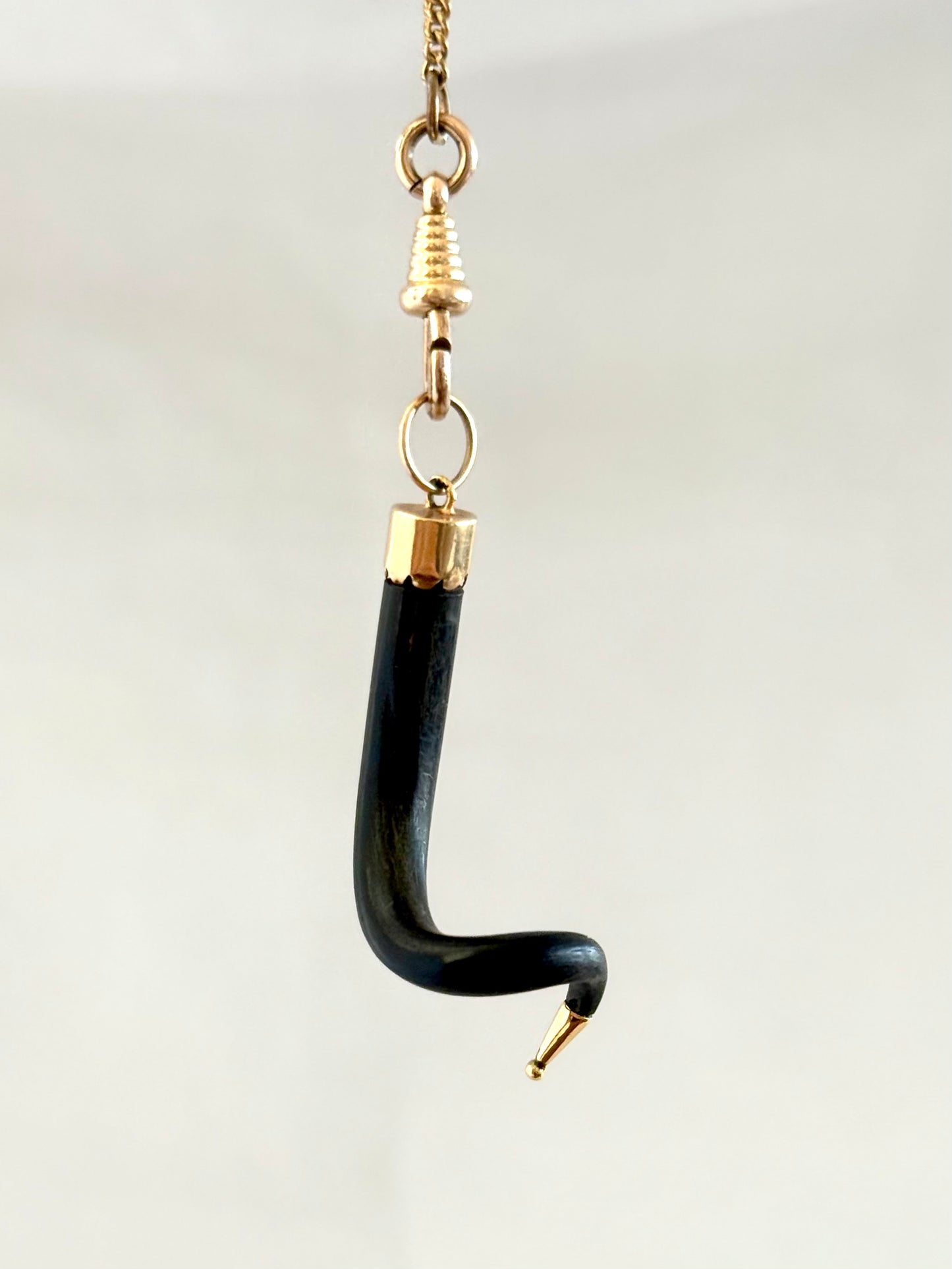 .14ct .1880s .1920s .585 gold and natural spiral twist horn amulet pendant