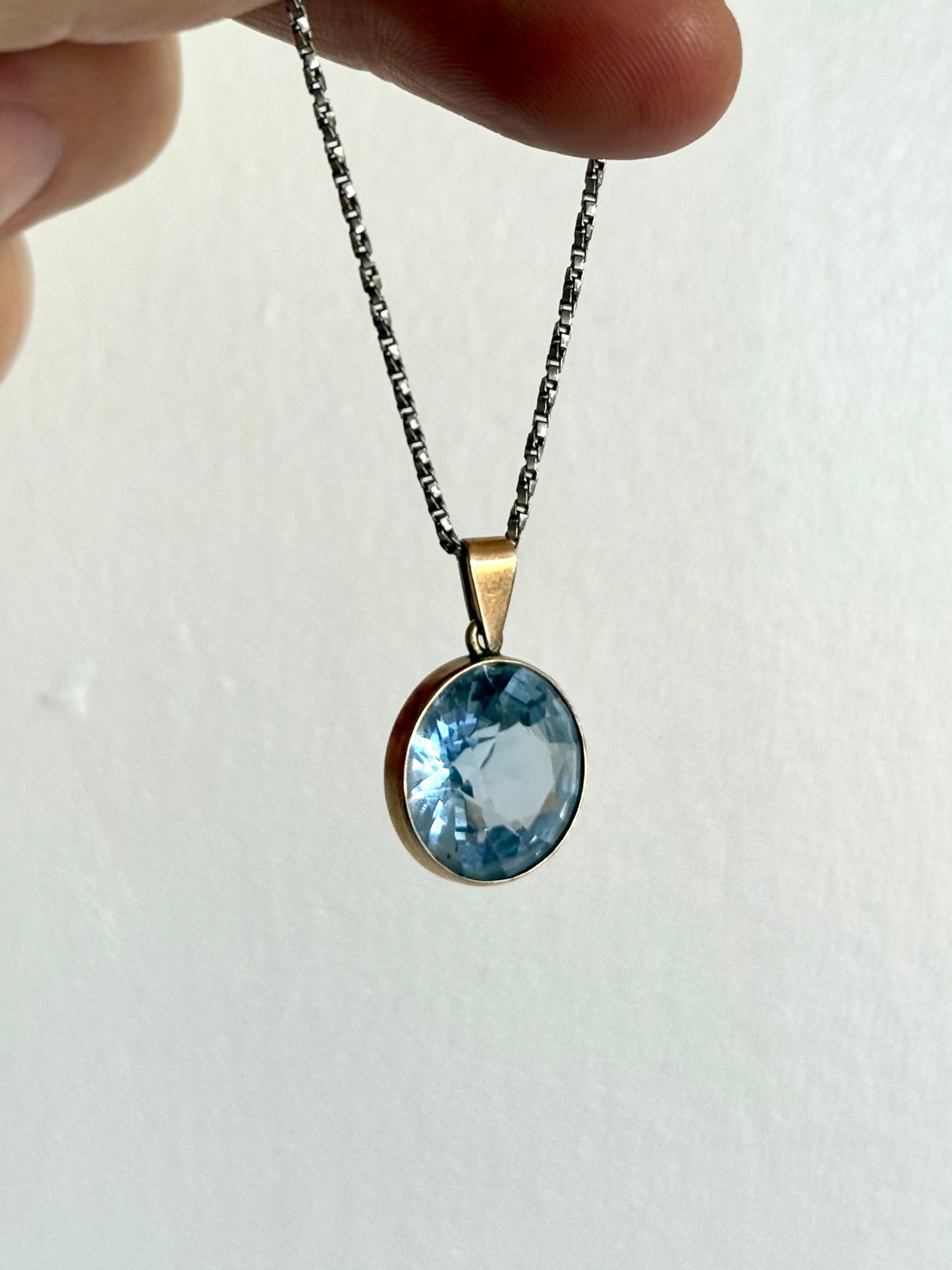 .375 6.94ct Aquamarine Bezel set modernist gold pendant