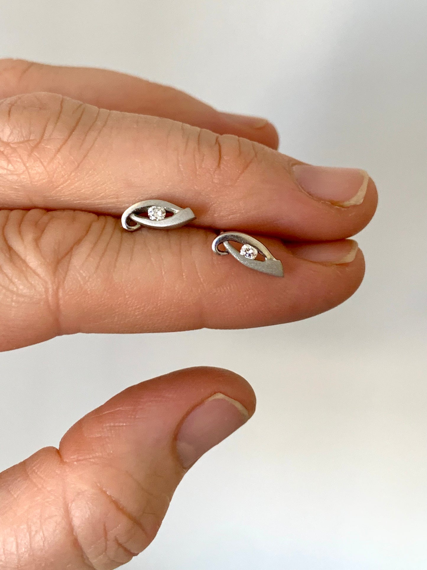 375 0.1ct Diamond and white 9ct gold fancy eye of horus diamond post stud push in earrings