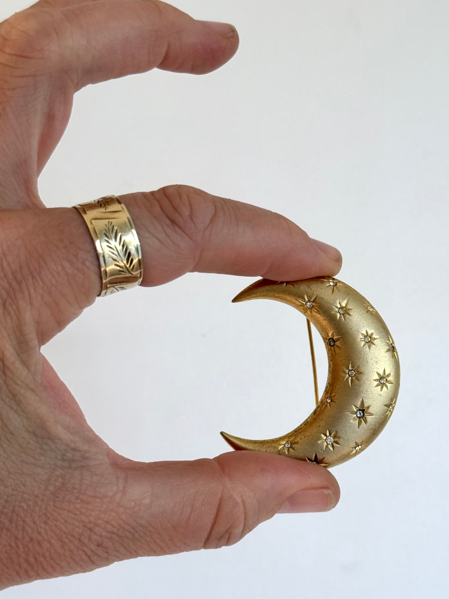 .1980s crescent moon puffy gold diamanté star accent costume moon brooch