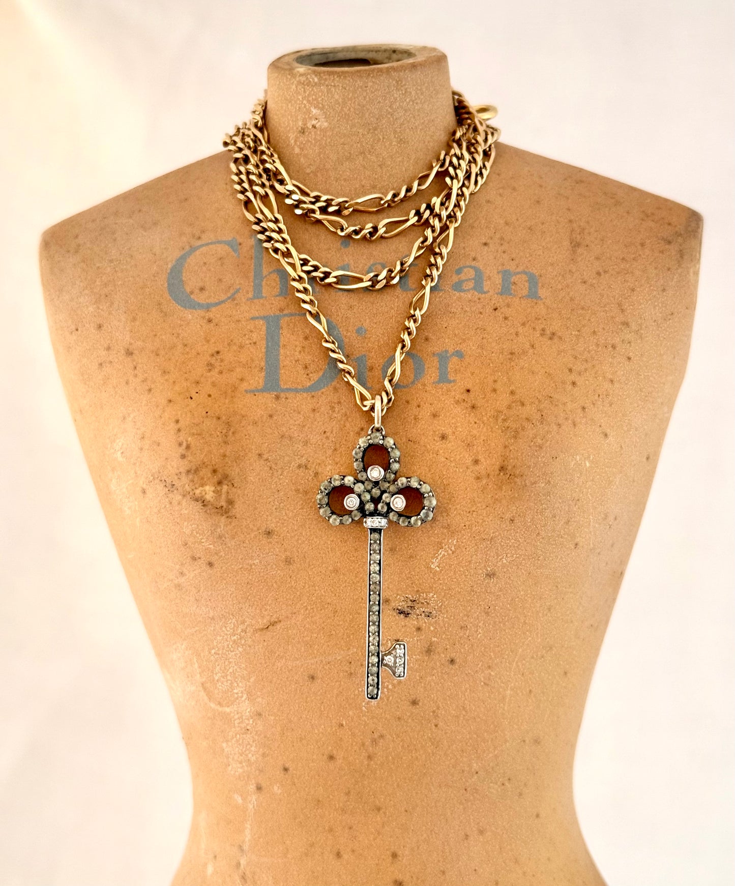 .18ct .750 .60 diamonds Brazilian designer white gold antique revival modernist diamond key luxury 18ct high carat gold and diamond studded romantic clover leaf key pendant