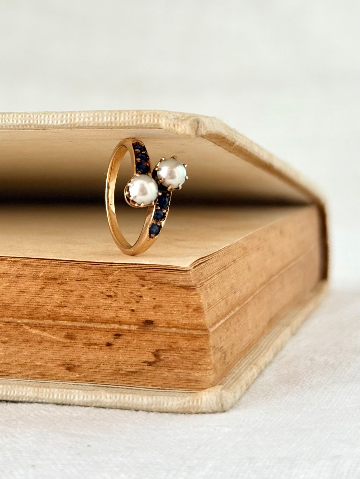 .14ct .1880s .1900s .585 gold antique Victorian Edwardian treasure Toi et Moi double pearl and sapphire bypass sweetheart commitment ring