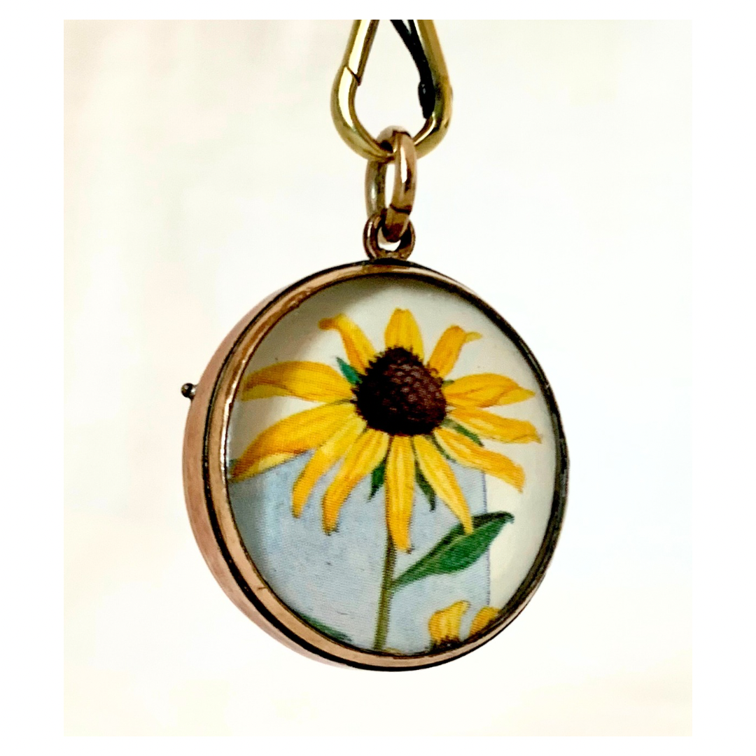 .1870s .1880s antique and very rare rock crystal Victorian solid rich gold pool of light style sought after antique orb circle memory locket.