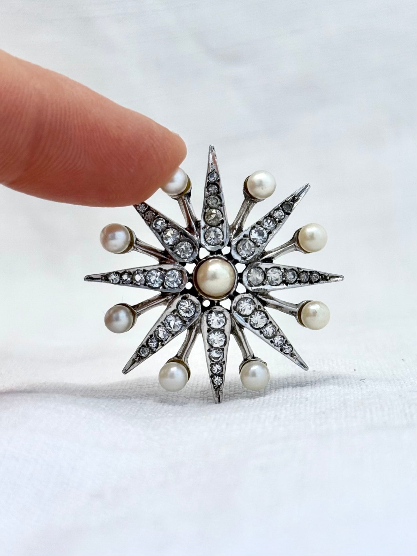 .1968 .925 Victorian revival 8 pointer sterling silver starburst star pendant with pearl and pave set diamanté gemstones
