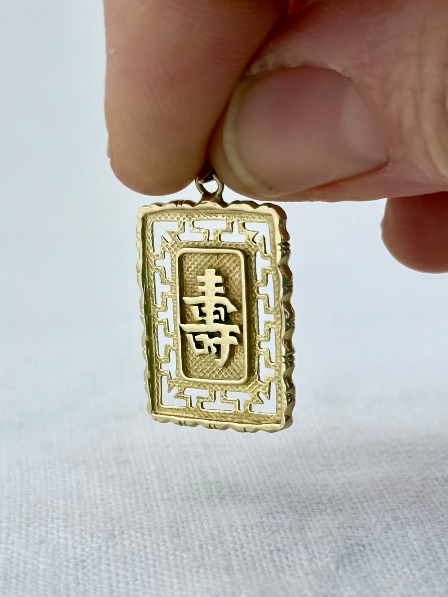 .14ct .1960s .1970s .545 Chinese Good luck and Longevity double sided high carat yellow golden token pendant