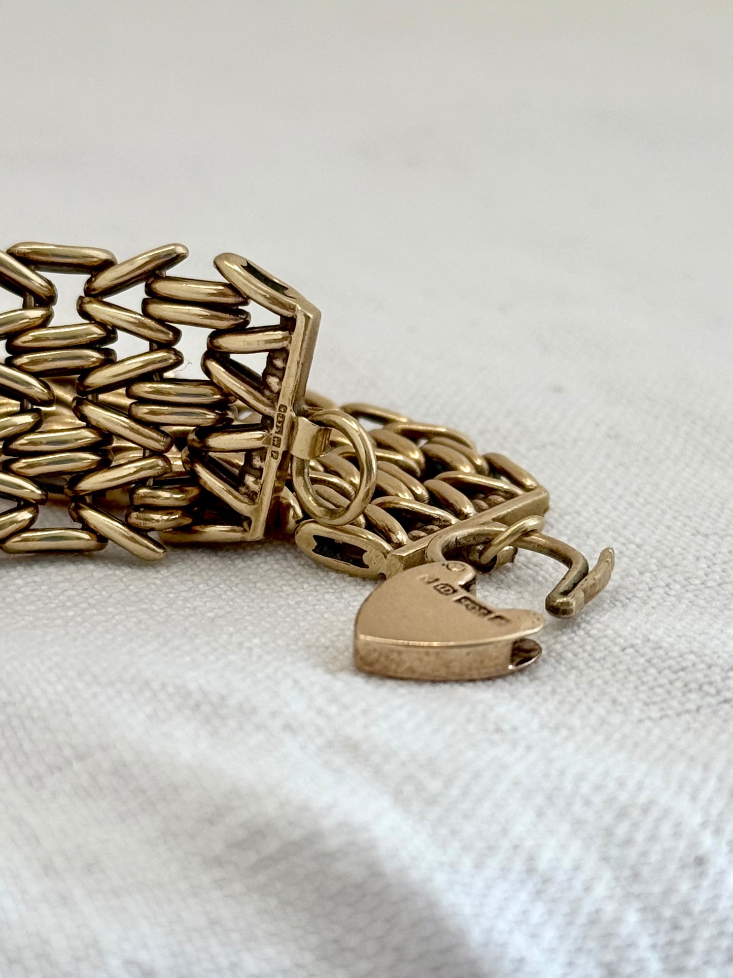 .1960 .1964 .375 9ct gold solid fancy link wide chunky width fancy link gate chain chain bracelet with gold heart padlock clasp