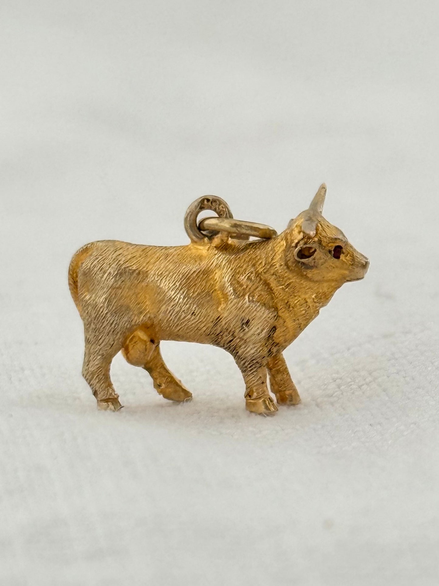 .14ct .1890s .1900s artisan crafted 585 yellow gold finely detailed Longhorn Heifer Bull figural charm with ruby eyes pendant