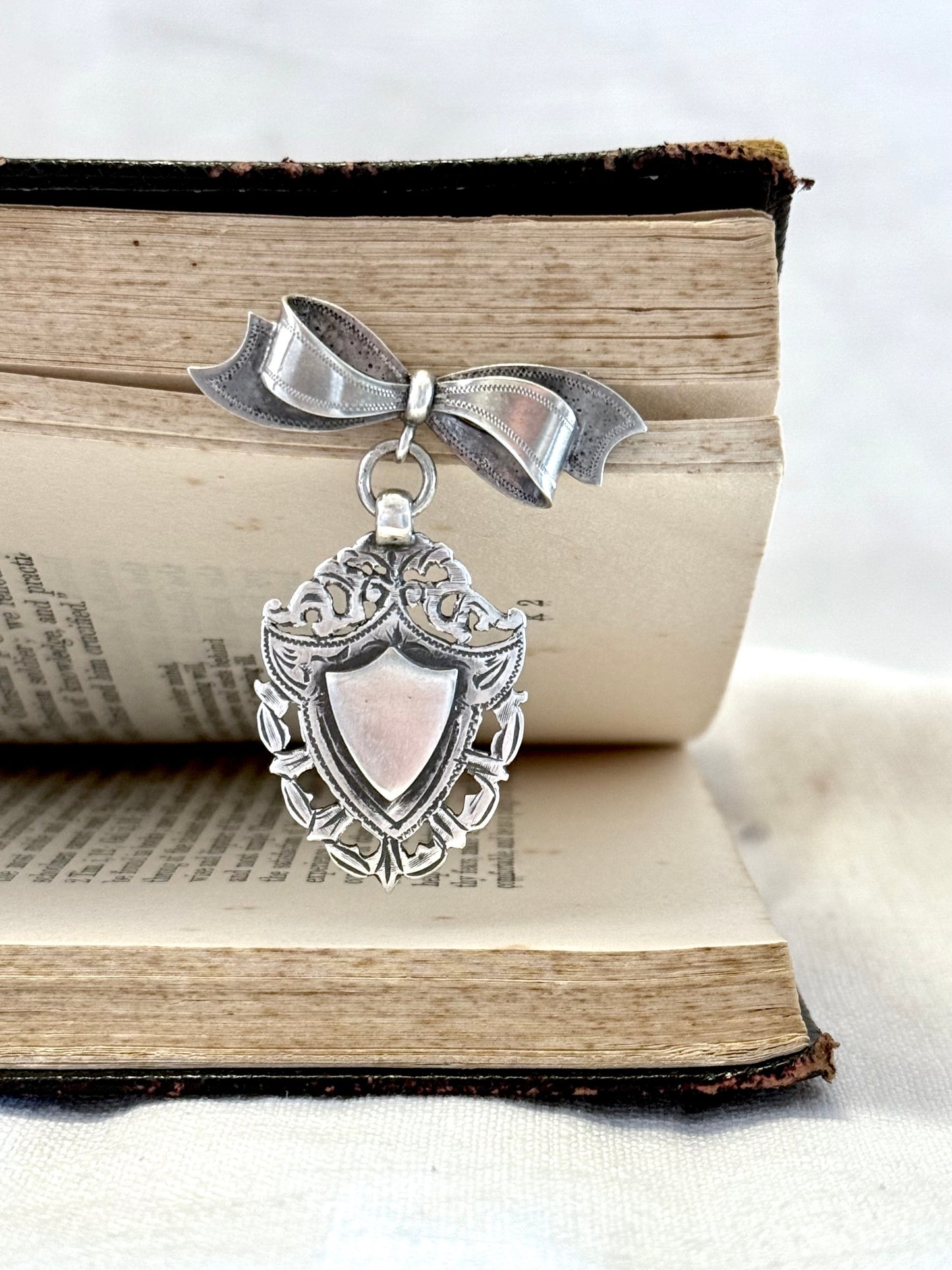 .1940s .1950s .925 Awards sterling silver Sweetheart bow and fob medallion brooch