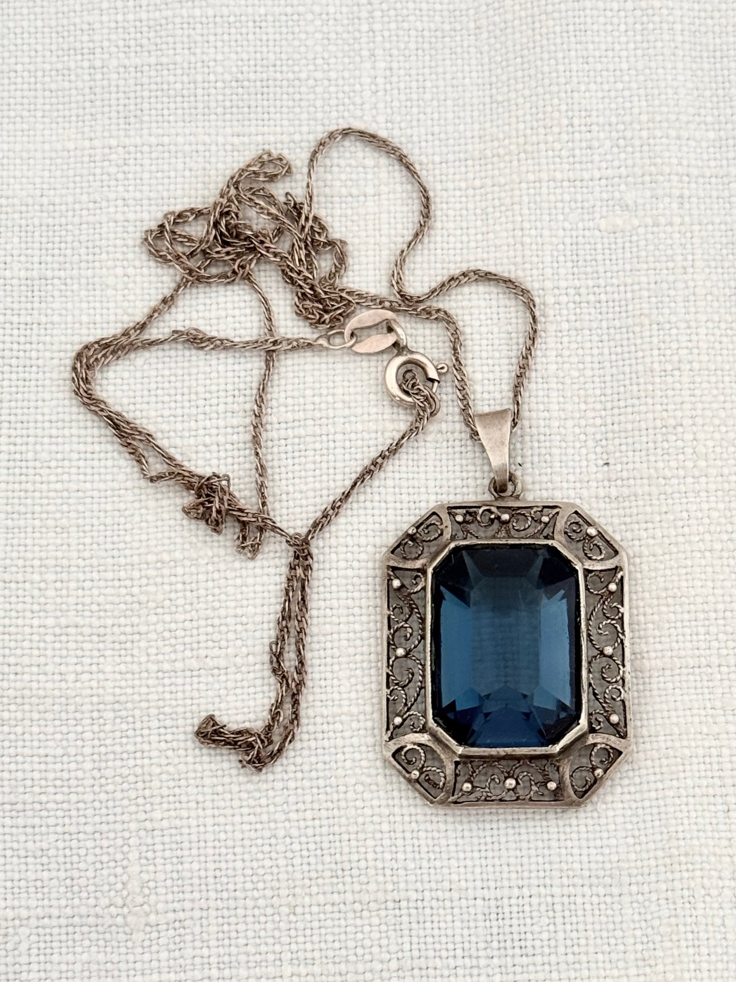.1930s .1940s .925 silver late Art Deco Sapphire blue faceted paste gemstone pendant on silver chain