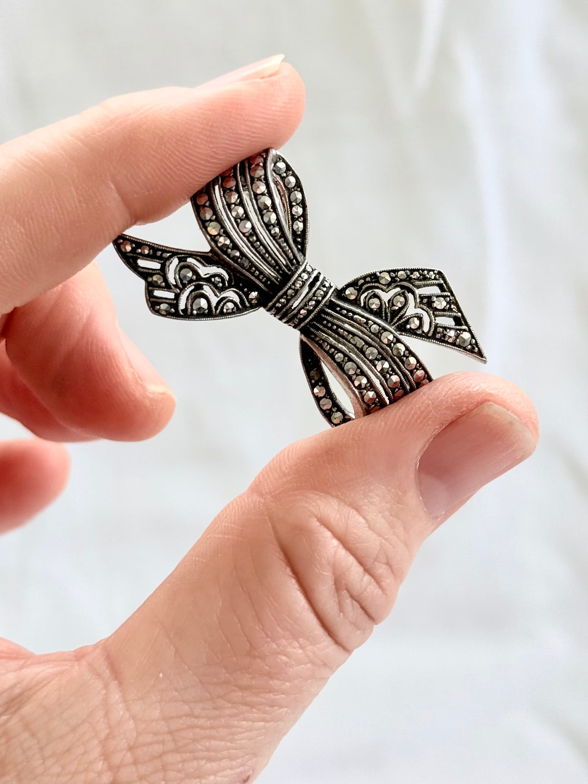 .1920s .1930s .800 Art Deco French Paris Bow Ribbon silver Marcasite gemstone sweetheart brooch