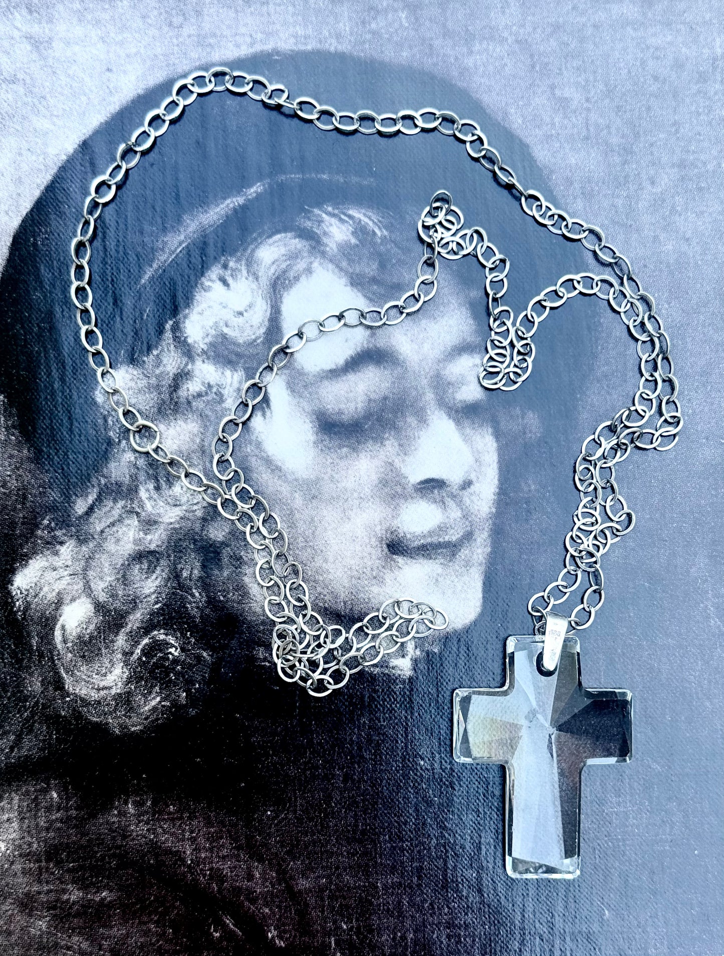 .925 .70cm long sterling silver modernist chain necklace with large faceted clear crystal glass cross pedant