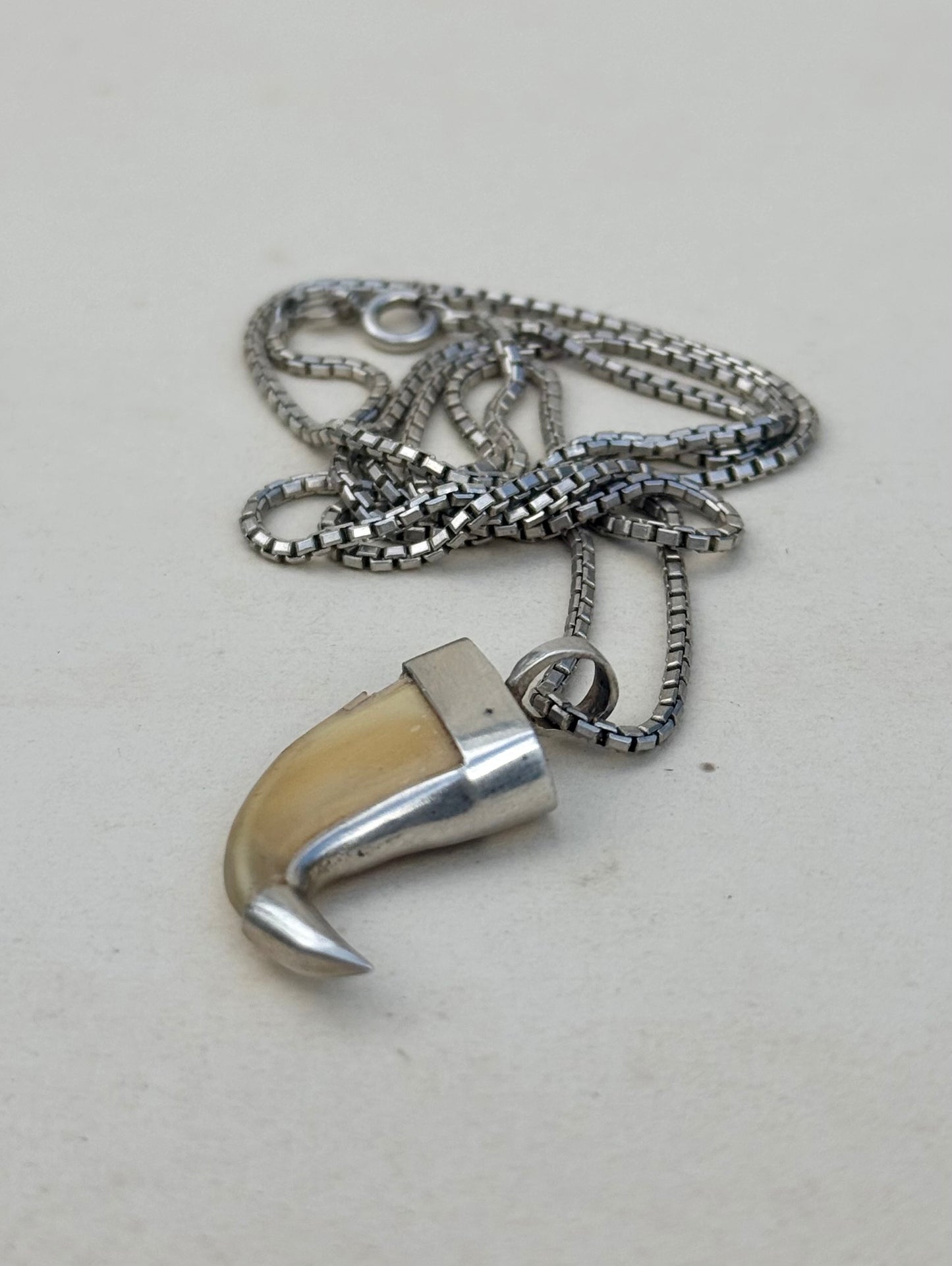 .925 silver Victorian revival lion claw pendant