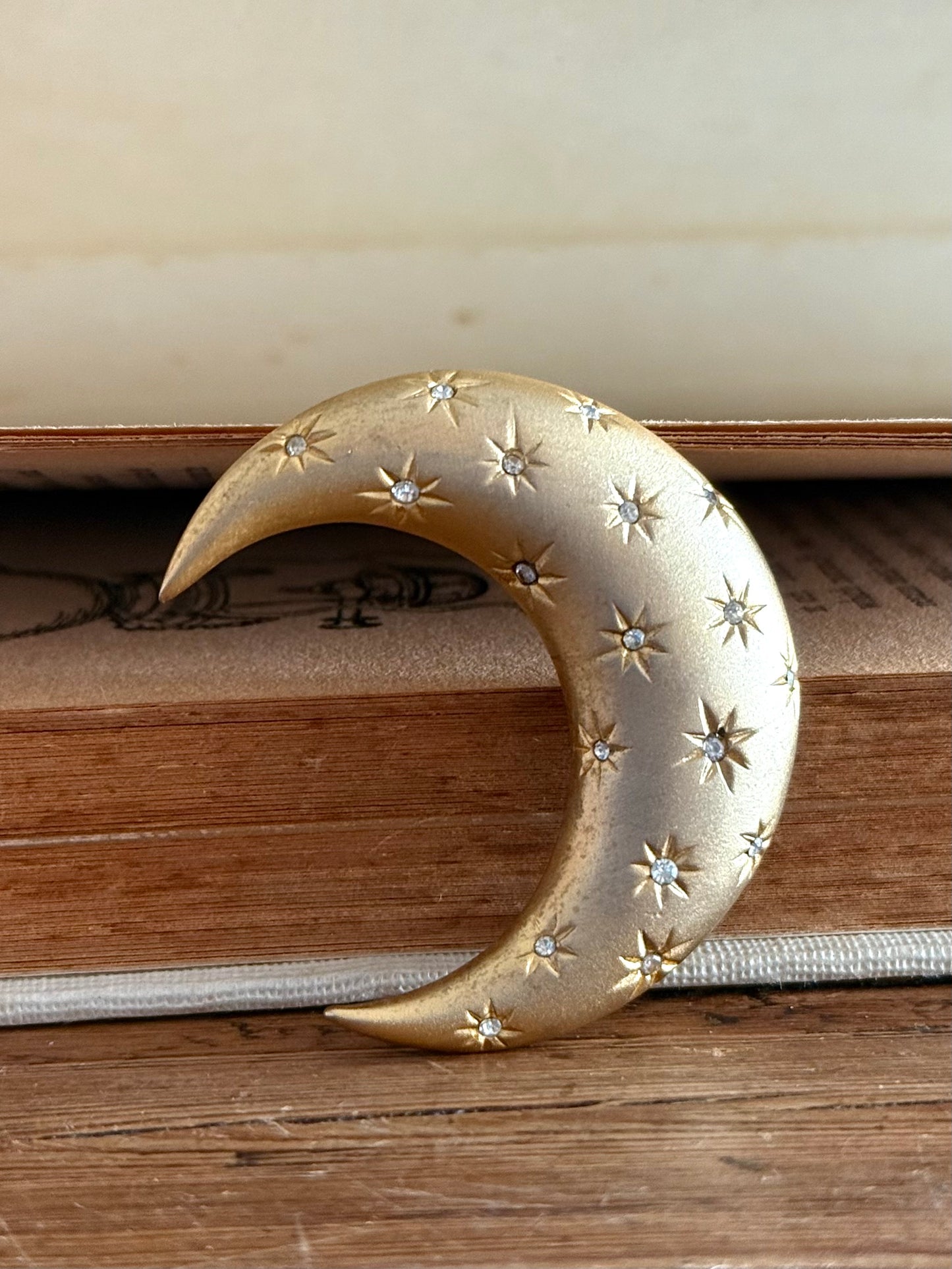 .1980s crescent moon puffy gold diamanté star accent costume moon brooch