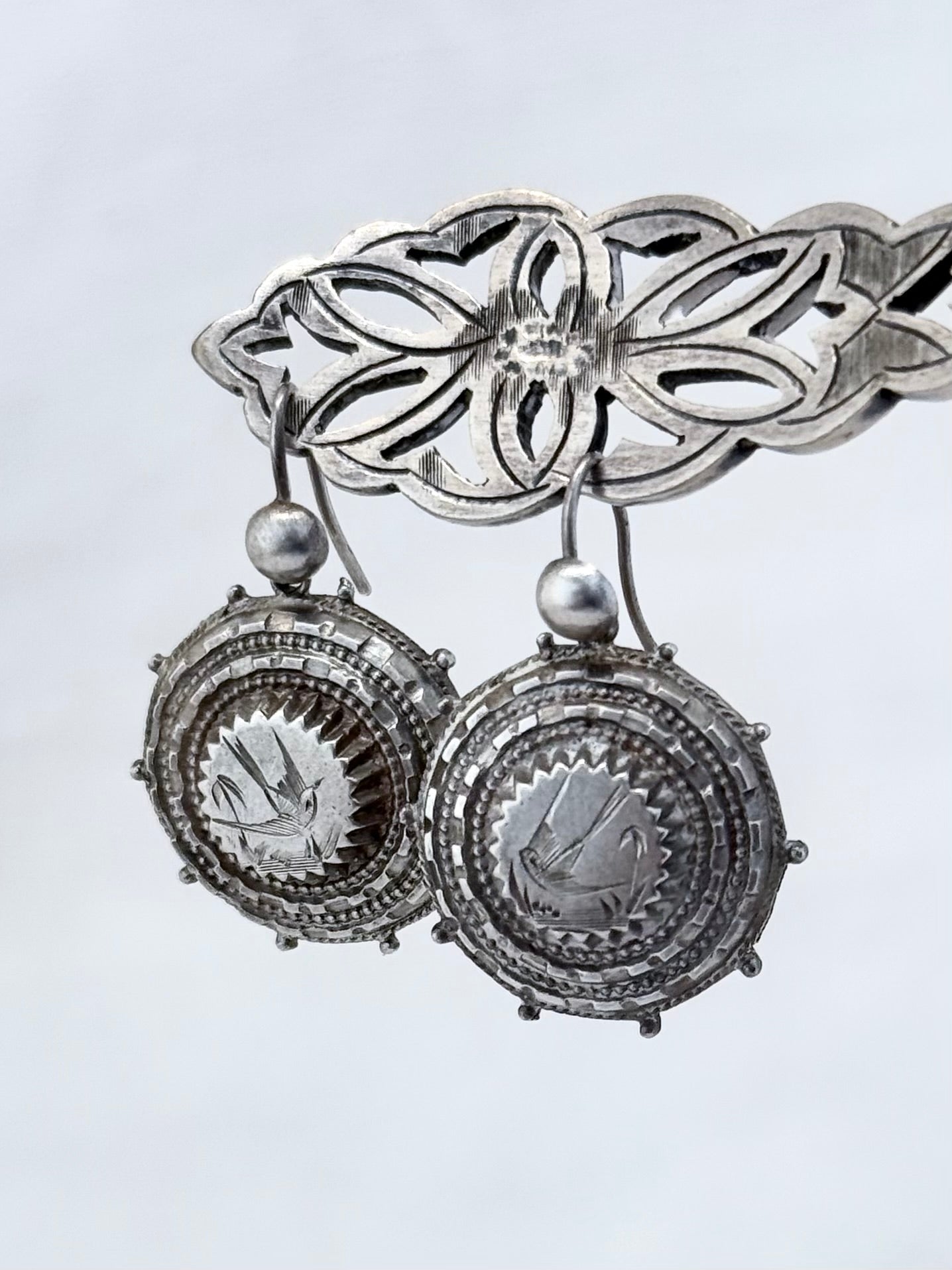 .1870s .1890s .925 Aesthetic Movement Etruscan revival rare and magnificent Victorian antique silver swallow bird sweetheart drop earrings
