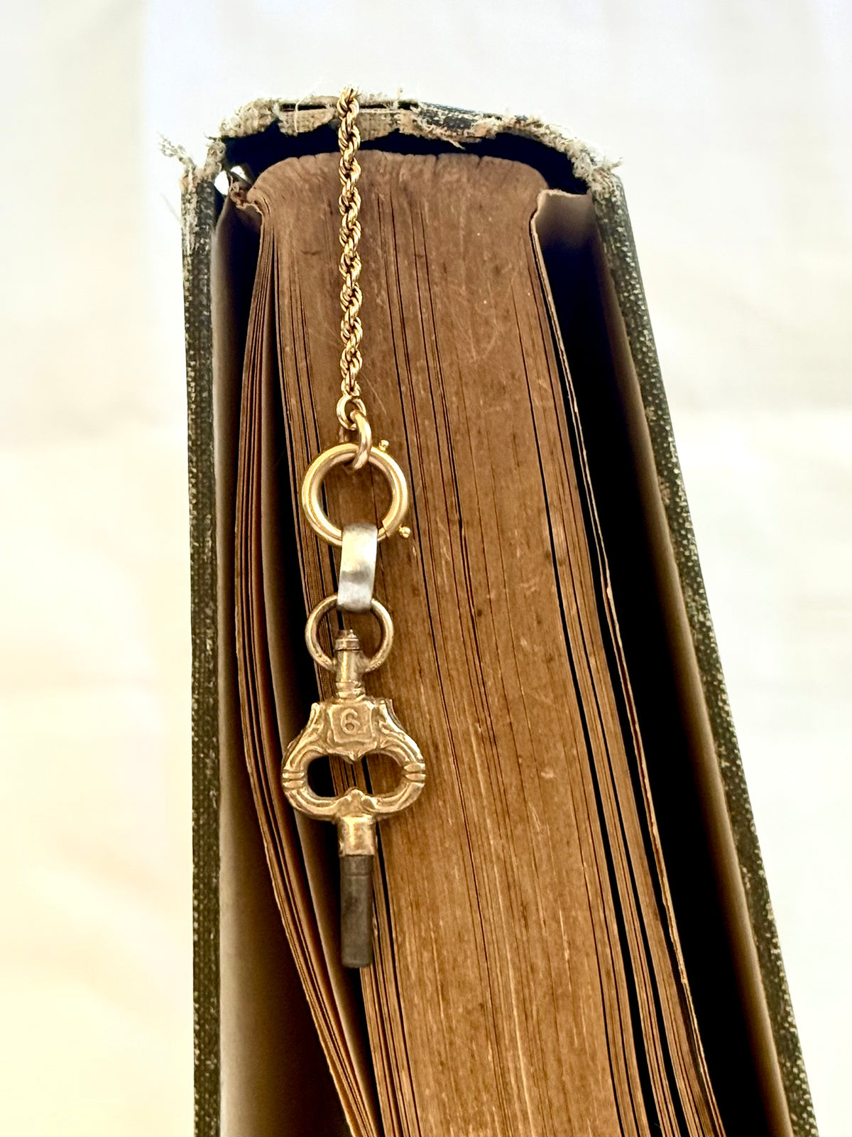 .1900s antique Art Nouveau brass watch winder key number 6 collectors silver fob pendant