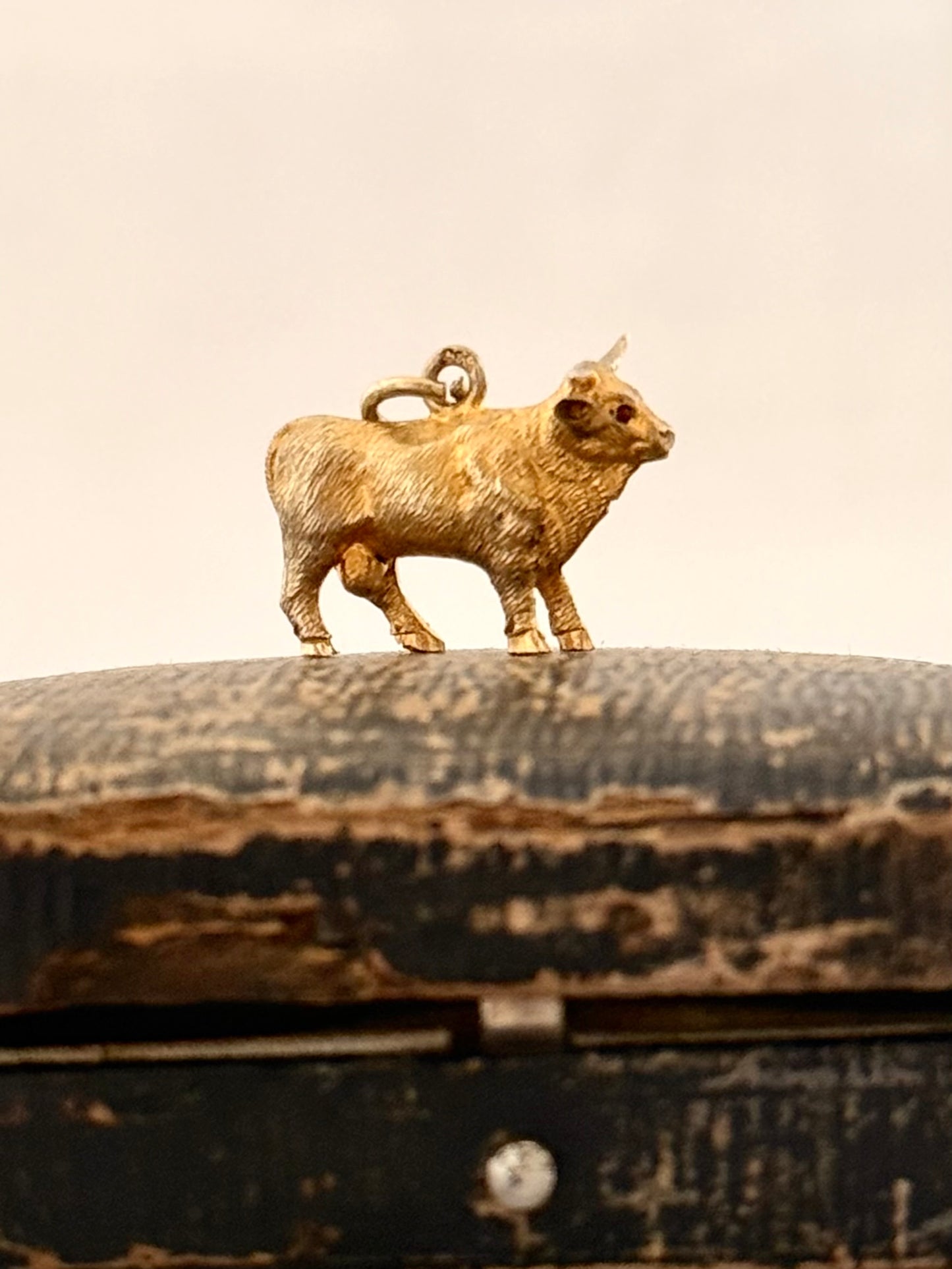 .14ct .1890s .1900s artisan crafted 585 yellow gold finely detailed Longhorn Heifer Bull figural charm with ruby eyes pendant