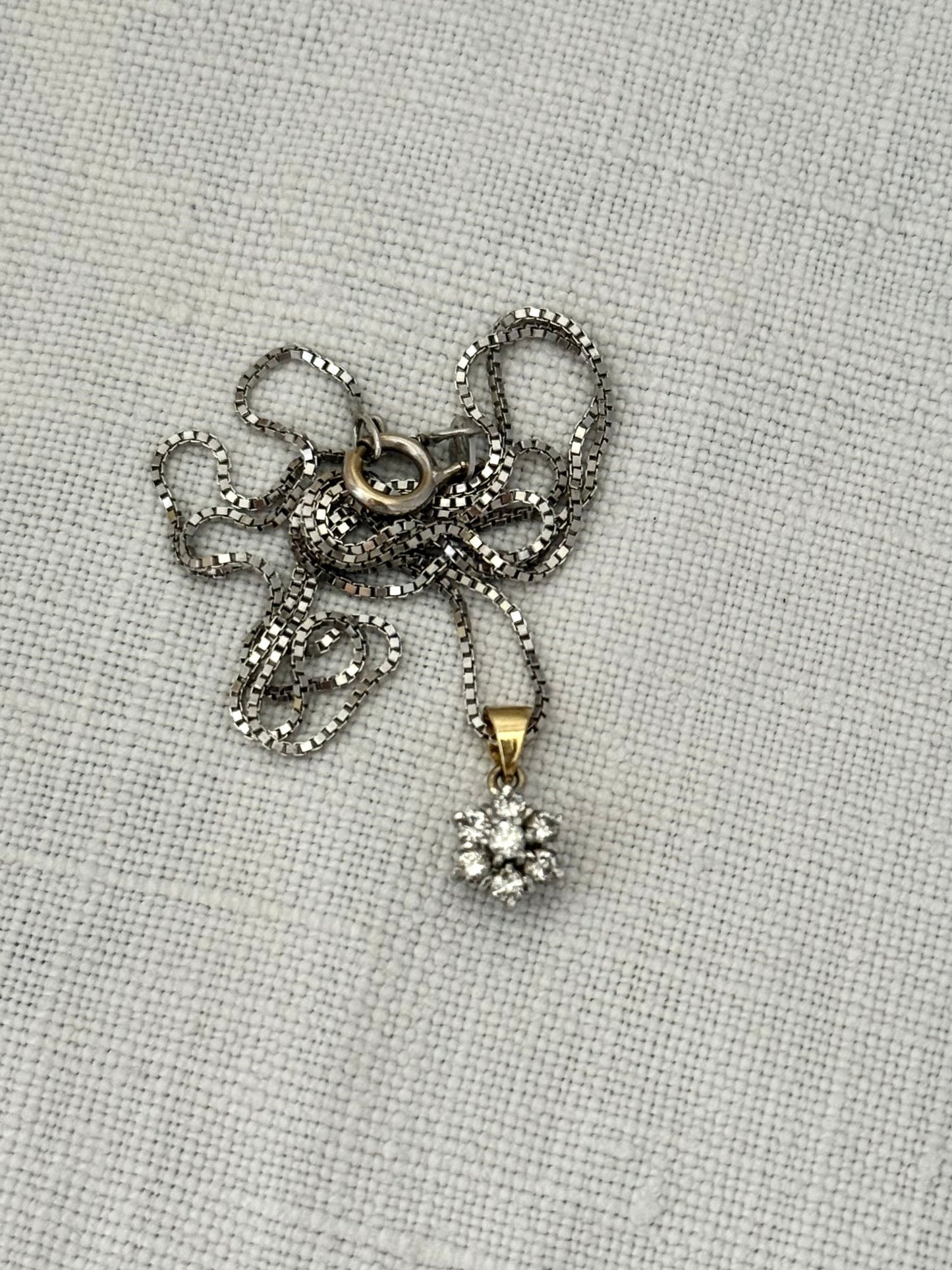 .1970s .375 gold 7 diamond star flower luxury gold pendant on modernist white gold box chain necklace