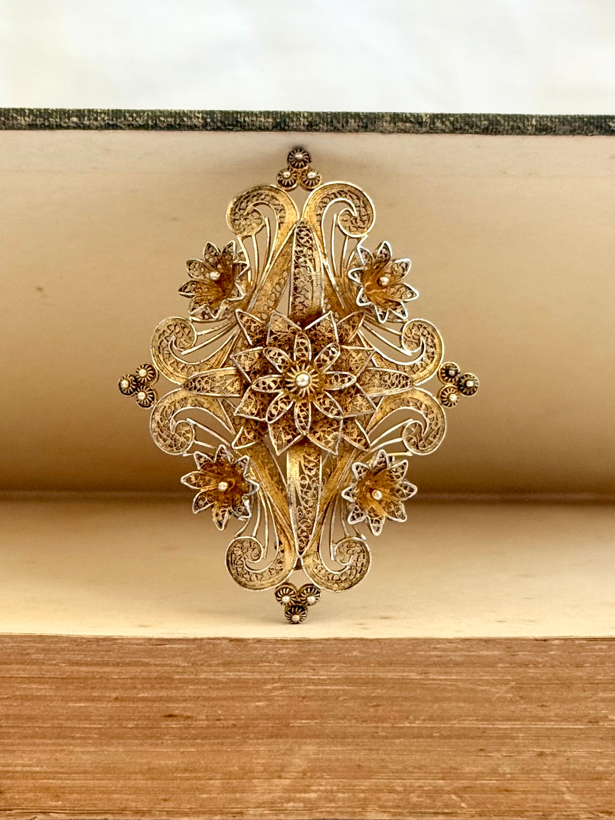 .1900s .1930s Portuguese fine gold tone cannetille floral form intricate filigree silver gold fill dress brooch pin