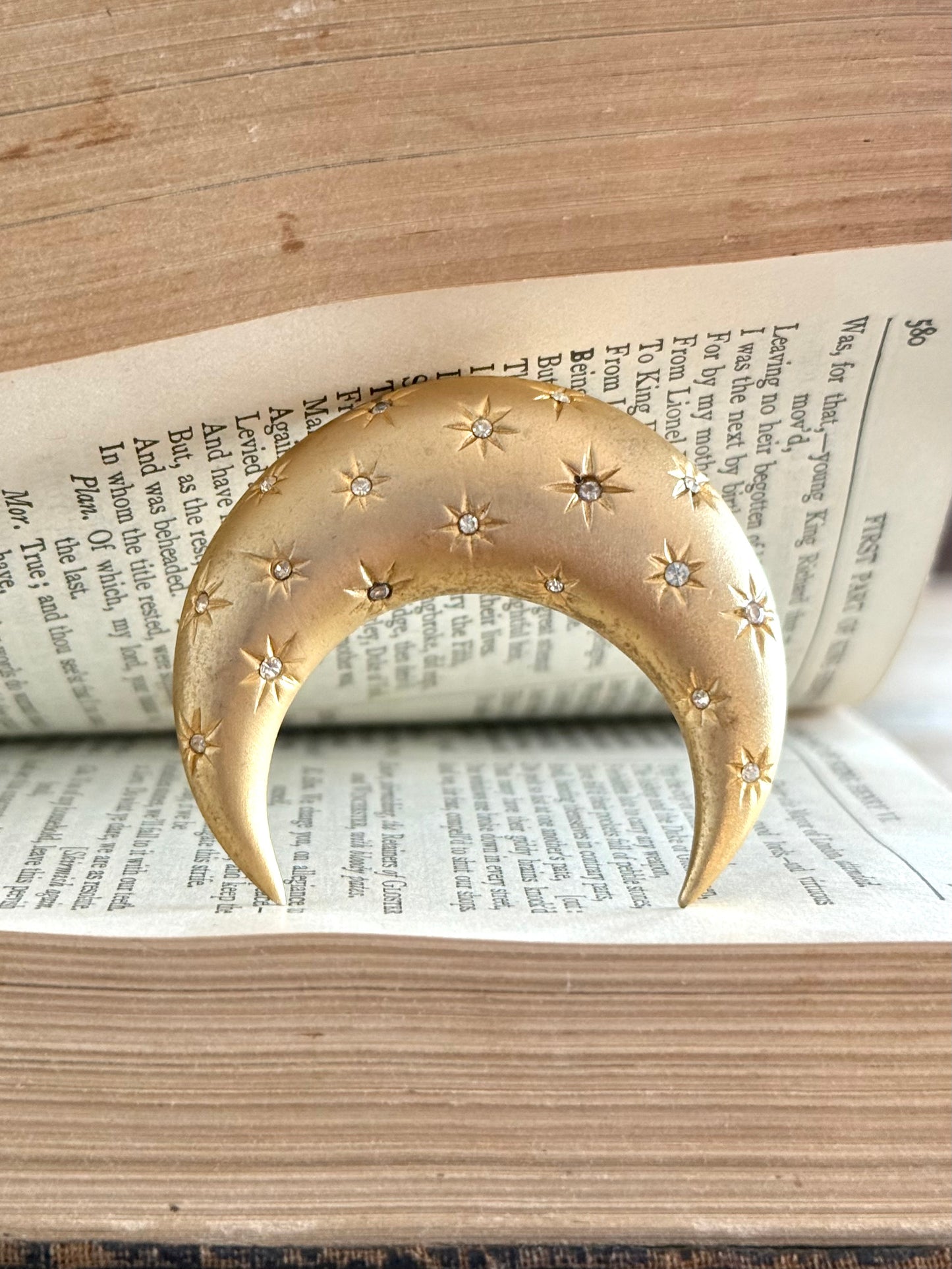 .1980s crescent moon puffy gold diamanté star accent costume moon brooch