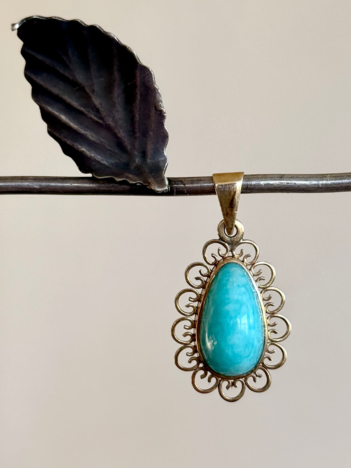 .1940s .1950s .375 .9ct gold Amazonite vintage yellow gold modernist teardrop pear shaped filigree scroll form frame blue green gemstone drop pendant.