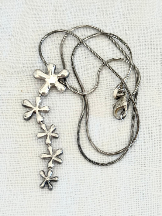 .925 .1950s revival modernist sterling silver floral waterfall drop pendant silver snake chain