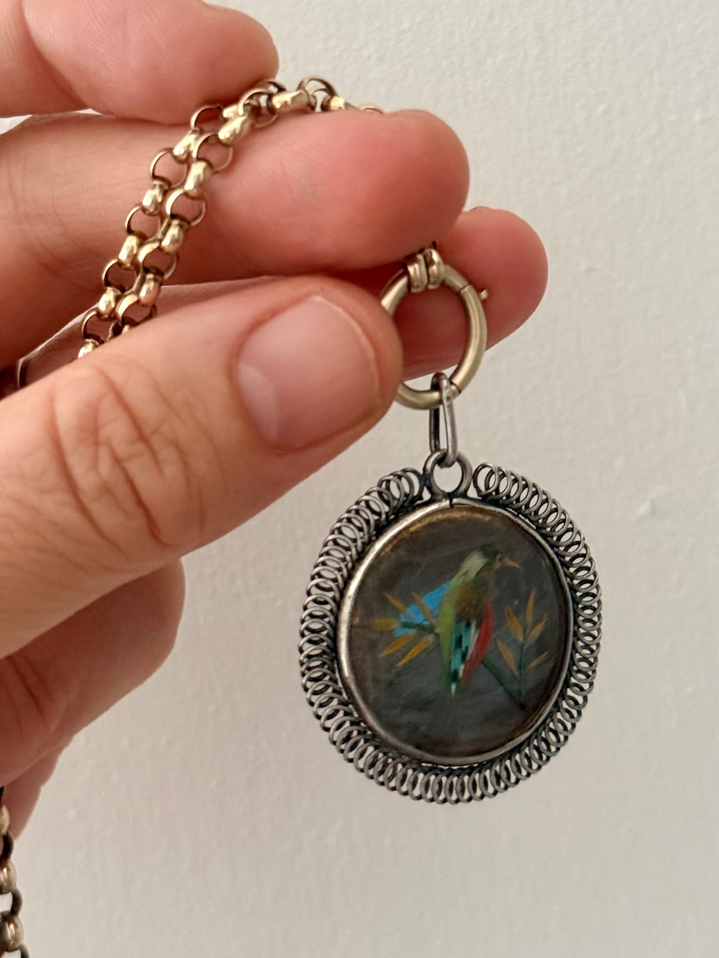 .1900s .1920s antique art fine feathered art exotic bird double sided silver locket pendant