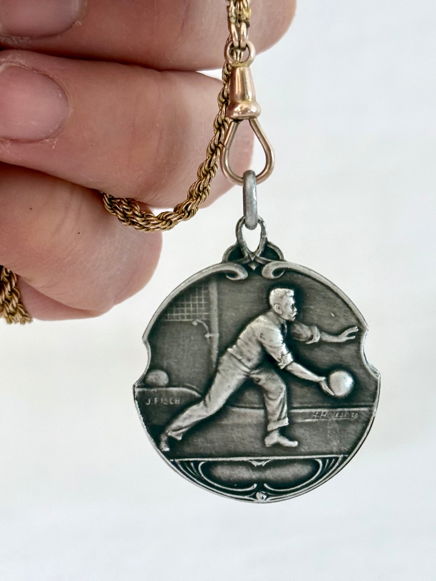 .1920s Art Nouveau Bowler sports medallion fob pendant