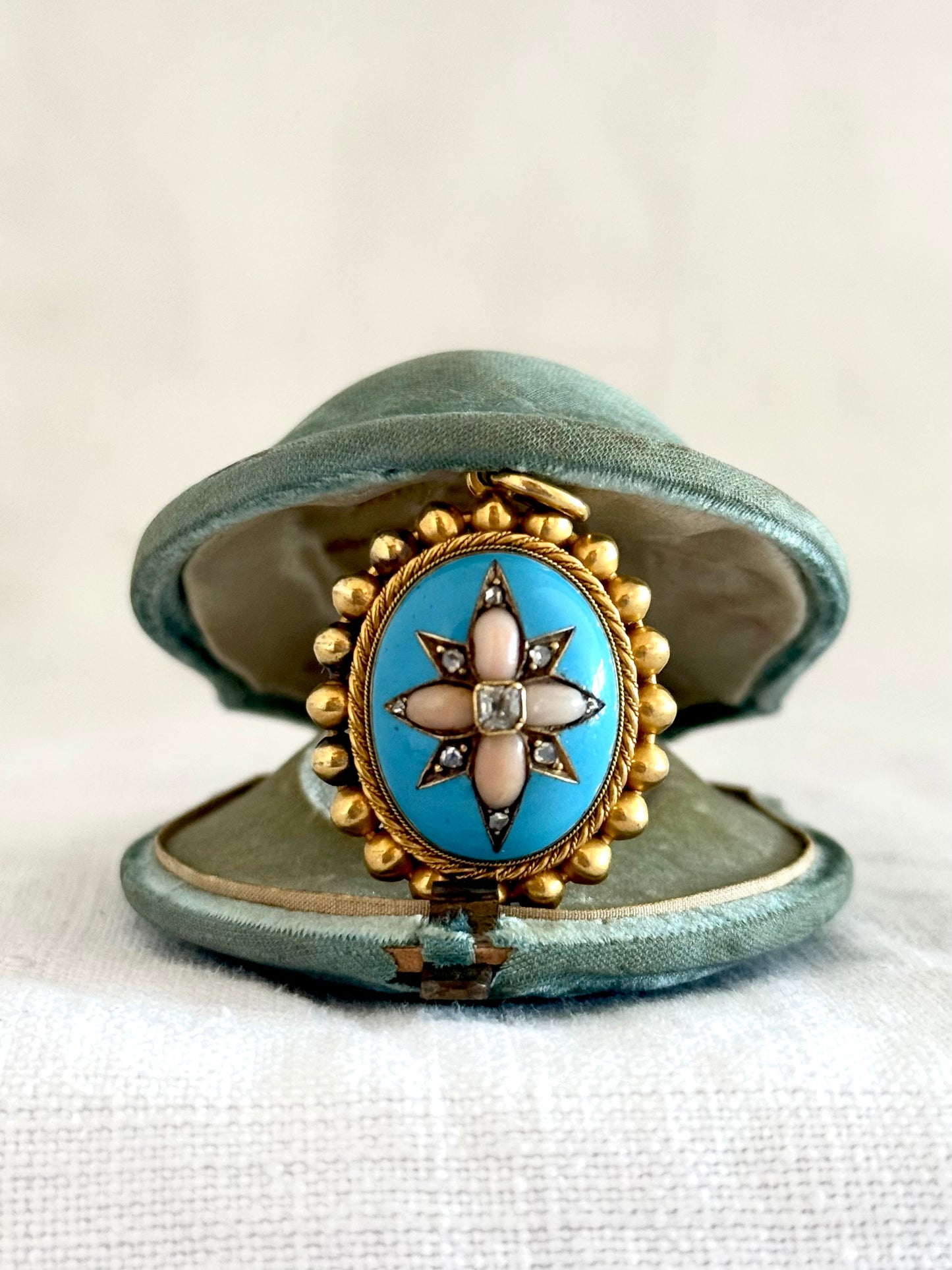 .15ct .1850s .1860s antique Victorian Yellow Gold Cushion cut Diamond Rose Cut Diamond star starburst Angel Coral and Blue Enamel Etruscan Revival Beaded border Mourning locket pendant