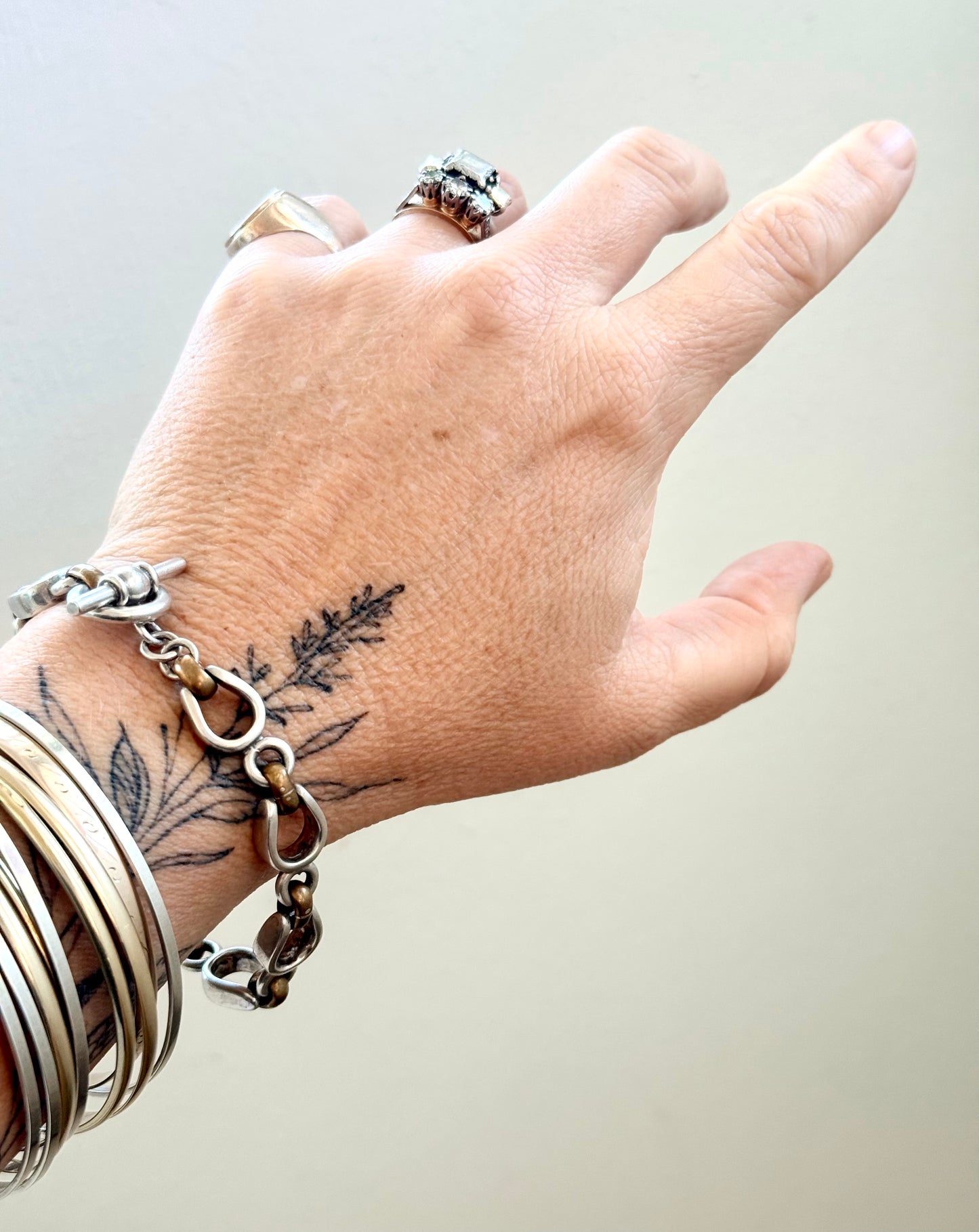 .925 Artisan made solid silver fancy horse shoe hoof link brass link t-bar chain bracelet