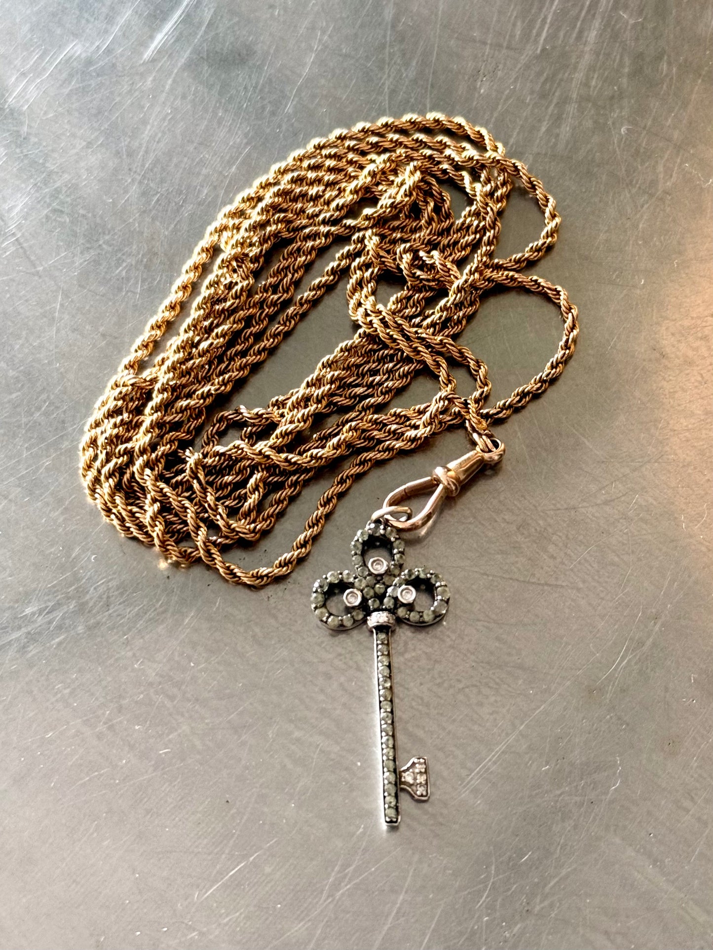 .18ct .750 .60 diamonds Brazilian designer white gold antique revival modernist diamond key luxury 18ct high carat gold and diamond studded romantic clover leaf key pendant