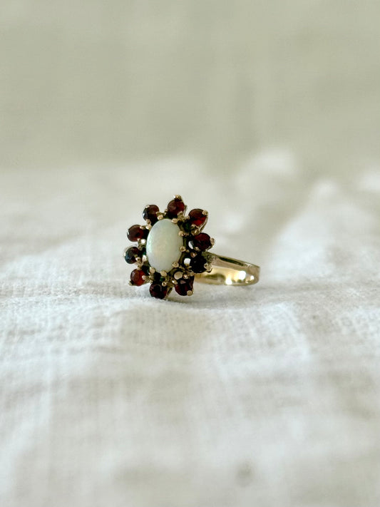 1930s .1940s .375 .9ct gold 1 opal 10 garnet 9ct yellow gold gemstone rosette halo flower cluster cocktail dress ring