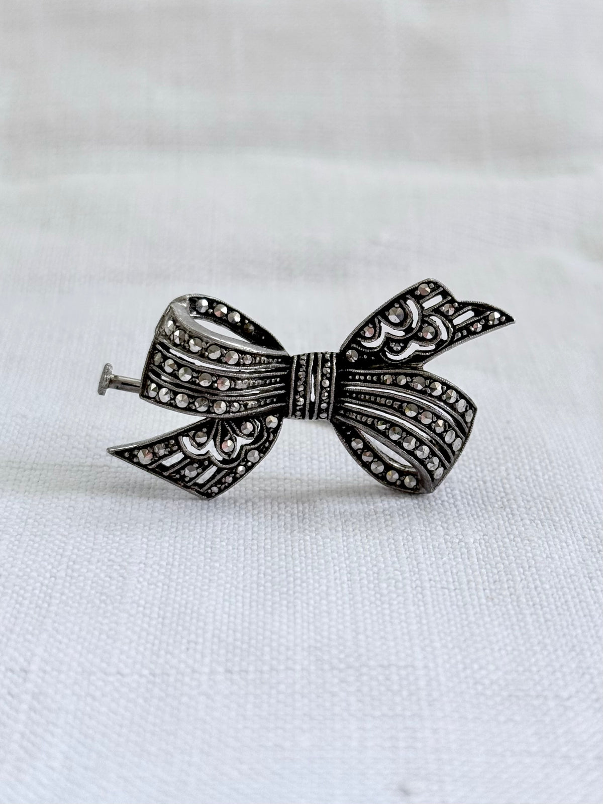 .1920s .1930s .800 Art Deco French Paris Bow Ribbon silver Marcasite gemstone sweetheart brooch