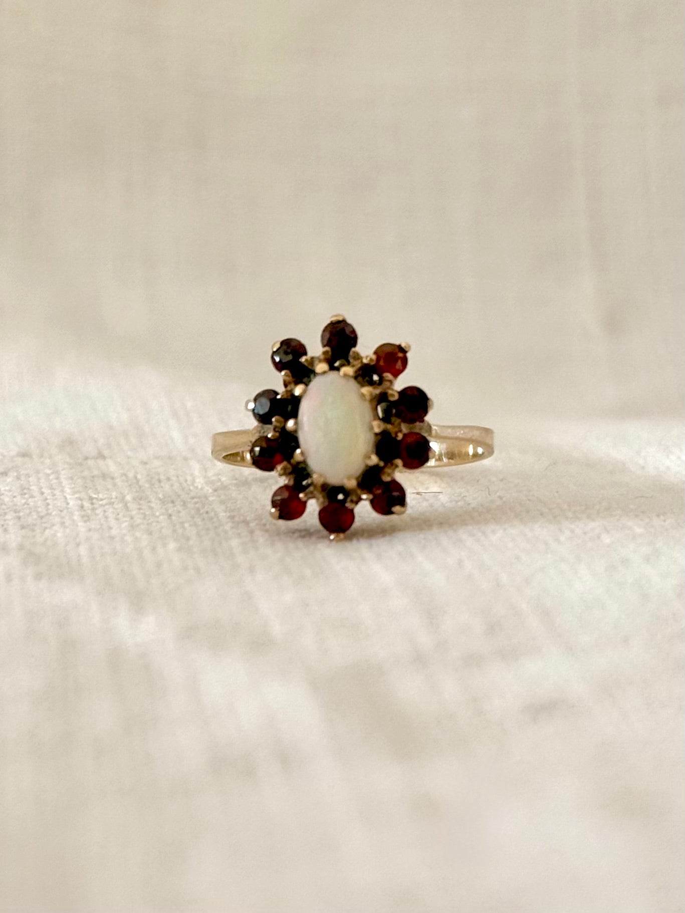 1930s .1940s .375 .9ct gold 1 opal 10 garnet 9ct yellow gold gemstone rosette halo flower cluster cocktail dress ring