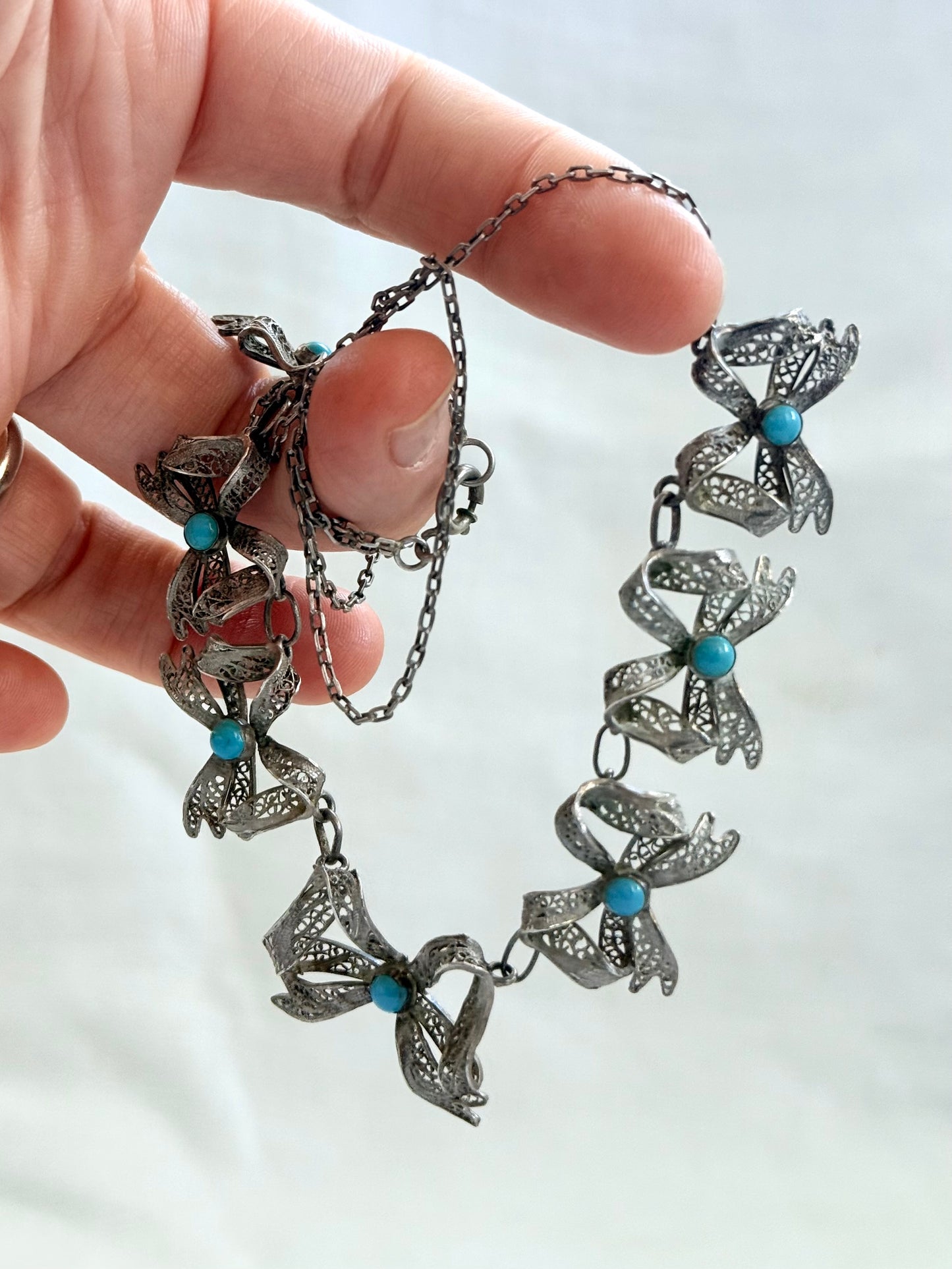 .1900s .1930s .916 silver vintage open work filigree wirework Bow Ribbon chain necklace
