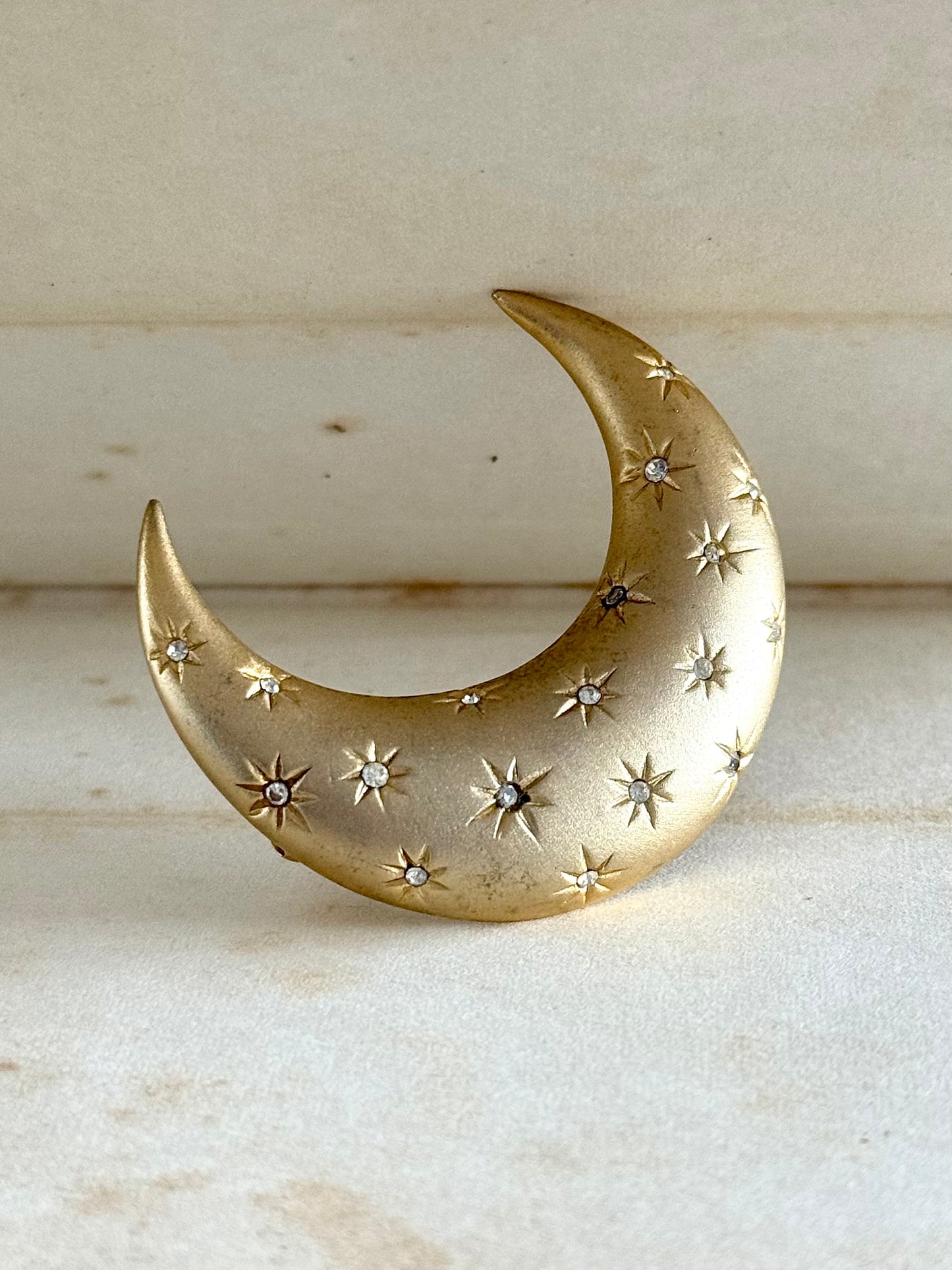 .1980s crescent moon puffy gold diamanté star accent costume moon brooch