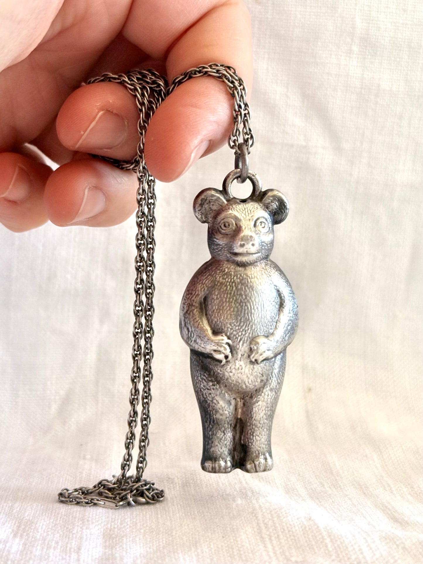 .1910s .1920s Art Nouveau figural collectors bear rattle baby rattle pendant on long silver chain