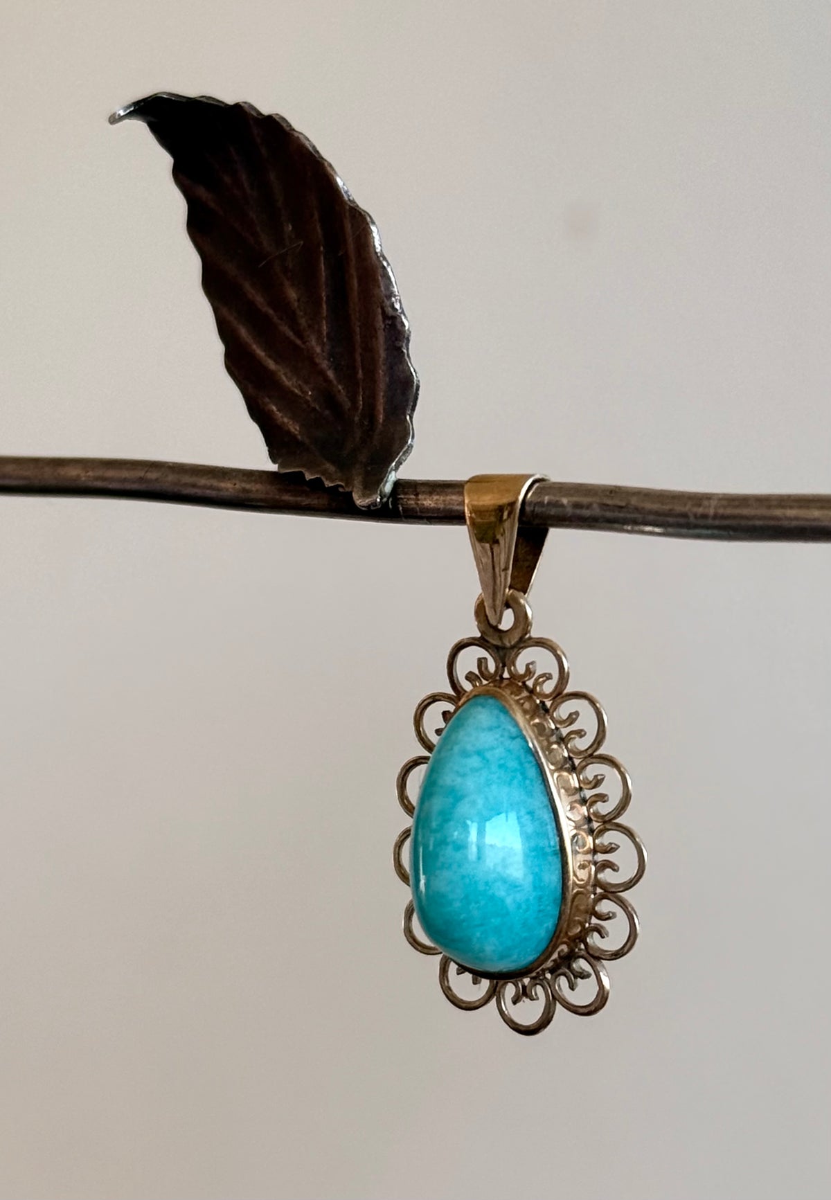 .1940s .1950s .375 .9ct gold Amazonite vintage yellow gold modernist teardrop pear shaped filigree scroll form frame blue green gemstone drop pendant.