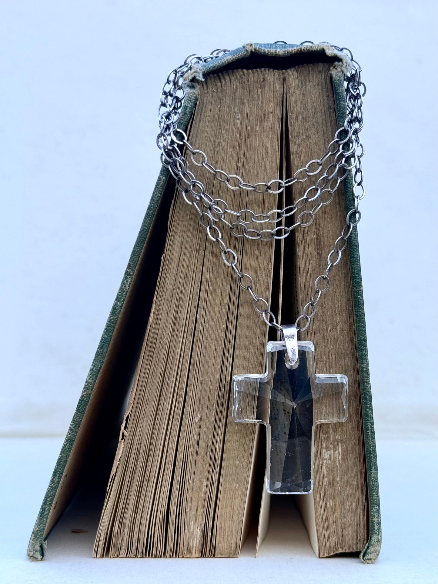 .925 .70cm long sterling silver modernist chain necklace with large faceted clear crystal glass cross pedant