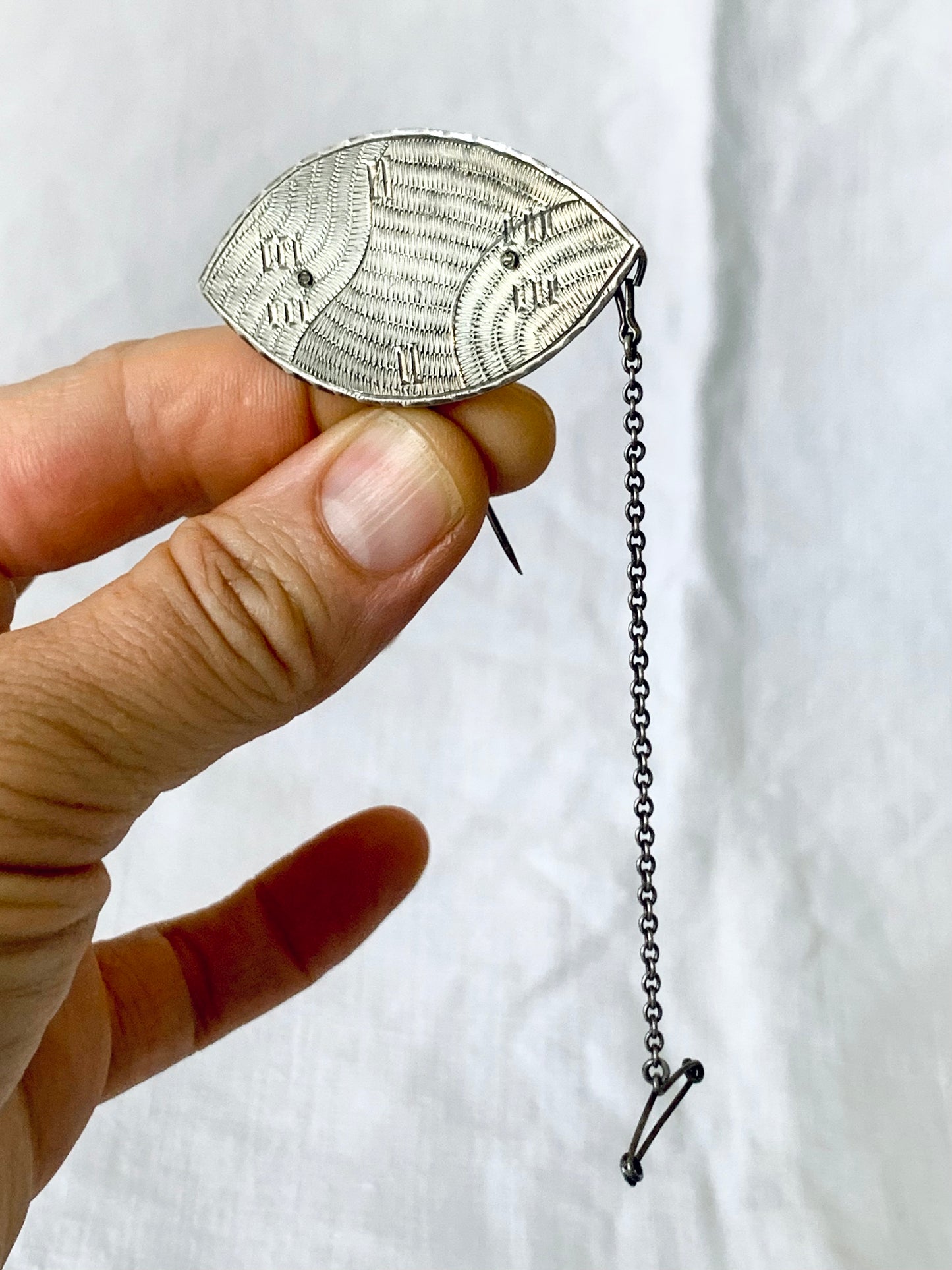 .925 1950s 1960s artisan made modernist tribal shield hand engraved hand made ellipse shape ethnic style shield brooch