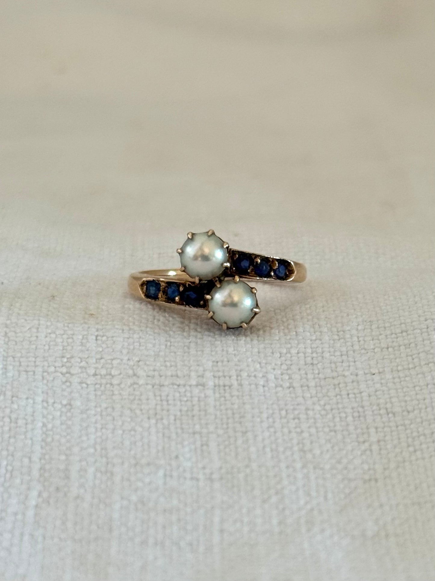 .14ct .1880s .1900s .585 gold antique Victorian Edwardian treasure Toi et Moi double pearl and sapphire bypass sweetheart commitment ring