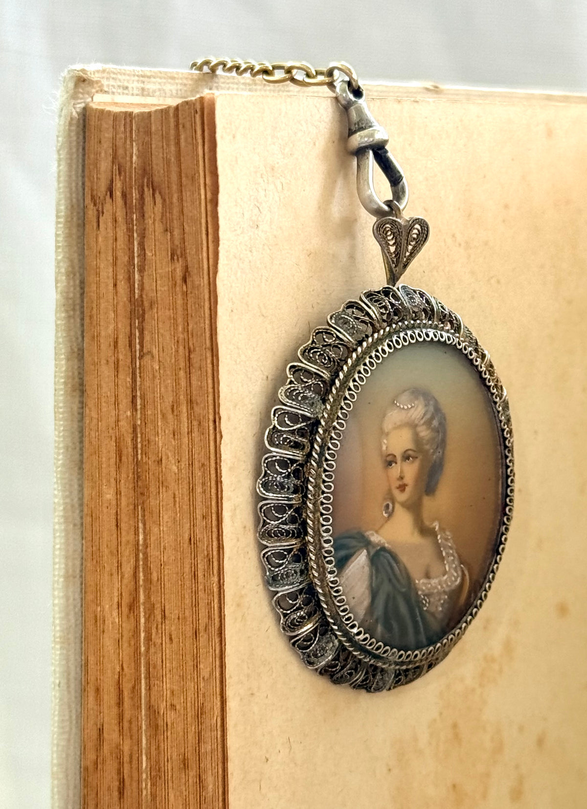 .1930s .1940s .800 Artist gold and silver incredible hand painted miniature Baroque revival portrait in fine silver filigree brooch and pendant