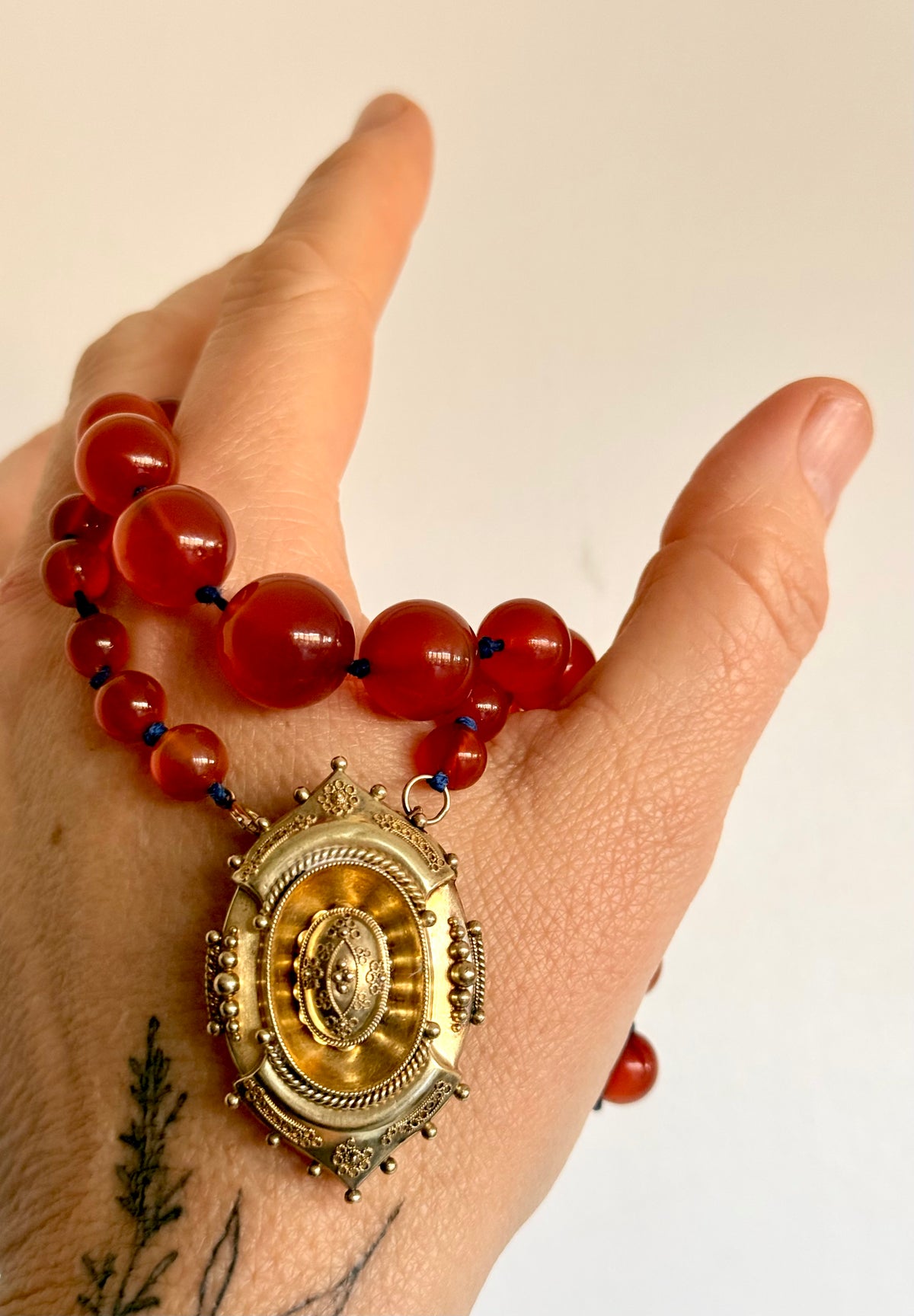 .1800s .375 .9ct gold Antique decorative fine Etruscan revival Victorian ornate gold oval pendant on luxury Carnelian bead graduated gemstone necklace setting