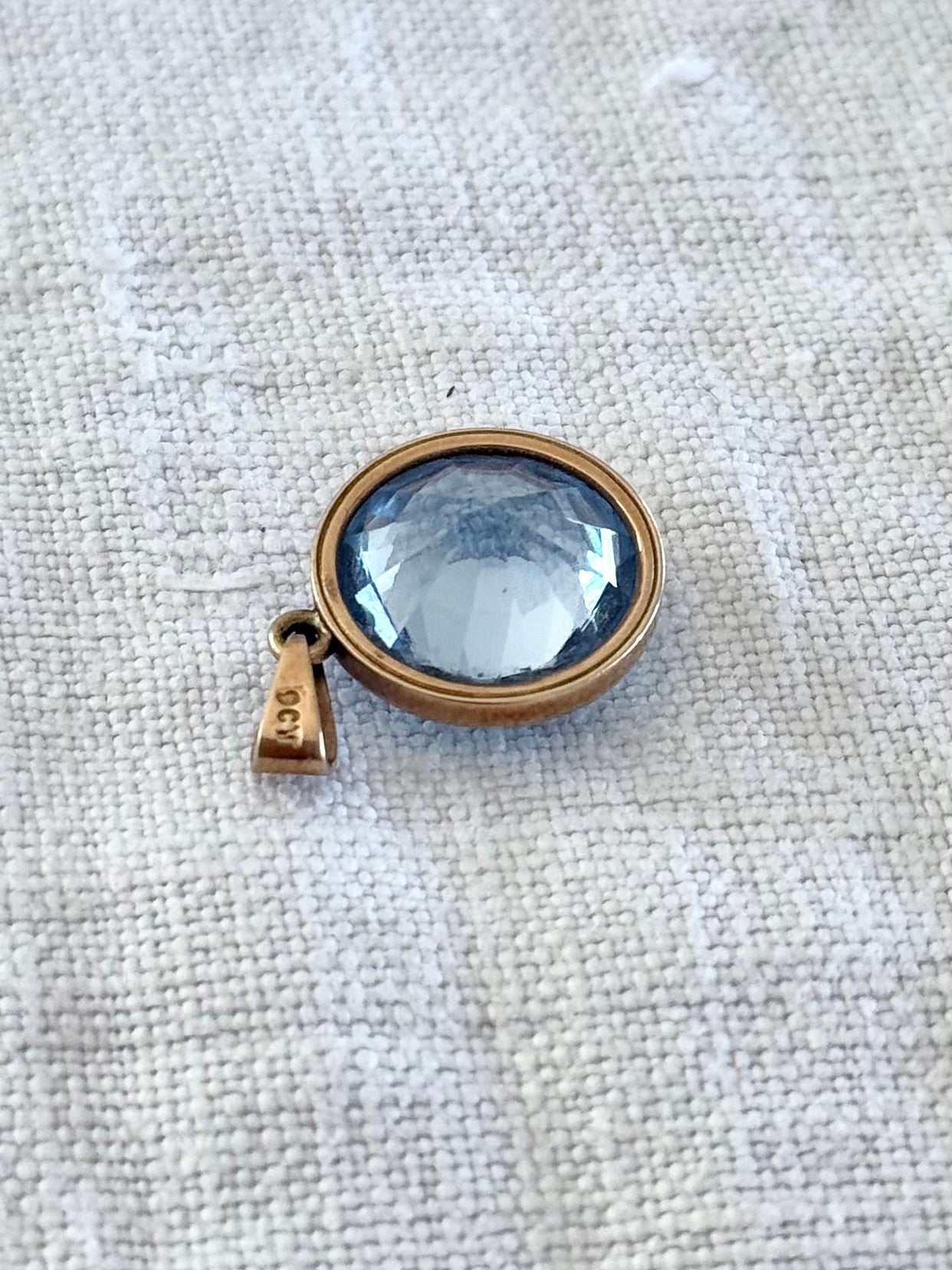 .375 6.94ct Aquamarine Bezel set modernist gold pendant