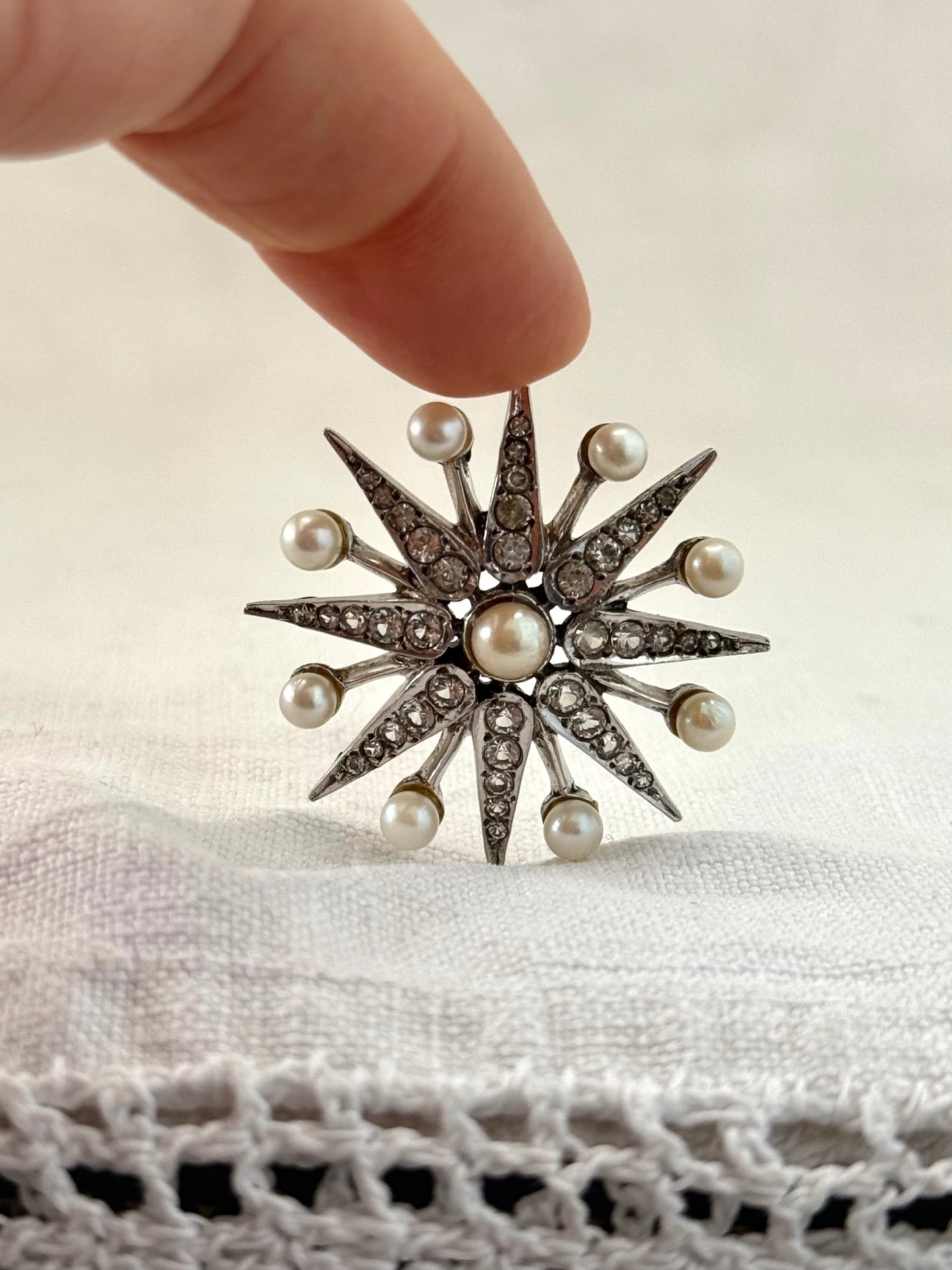 .1968 .925 Victorian revival 8 pointer sterling silver starburst star pendant with pearl and pave set diamanté gemstones