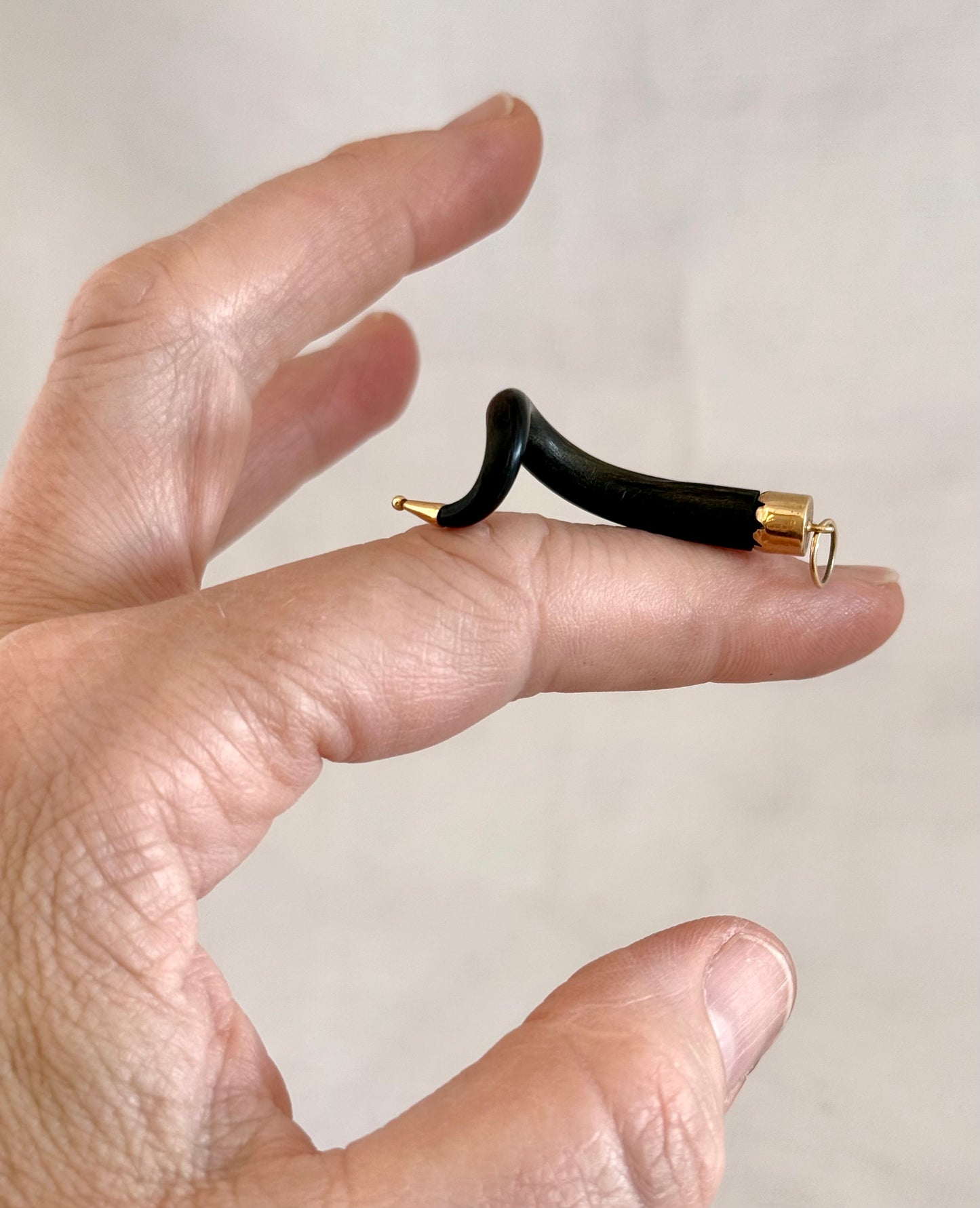 .14ct .1880s .1920s .585 gold and natural spiral twist horn amulet pendant