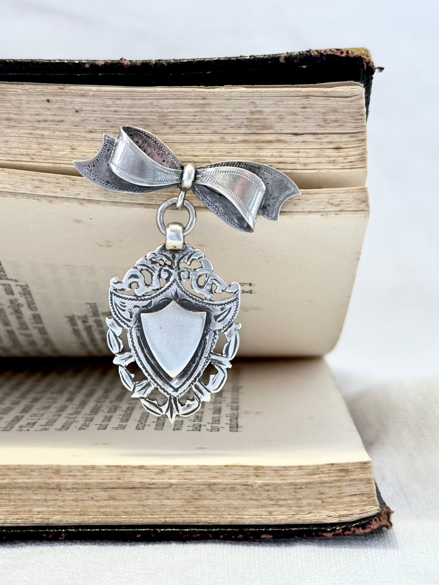 .1940s .1950s .925 Awards sterling silver Sweetheart bow and fob medallion brooch