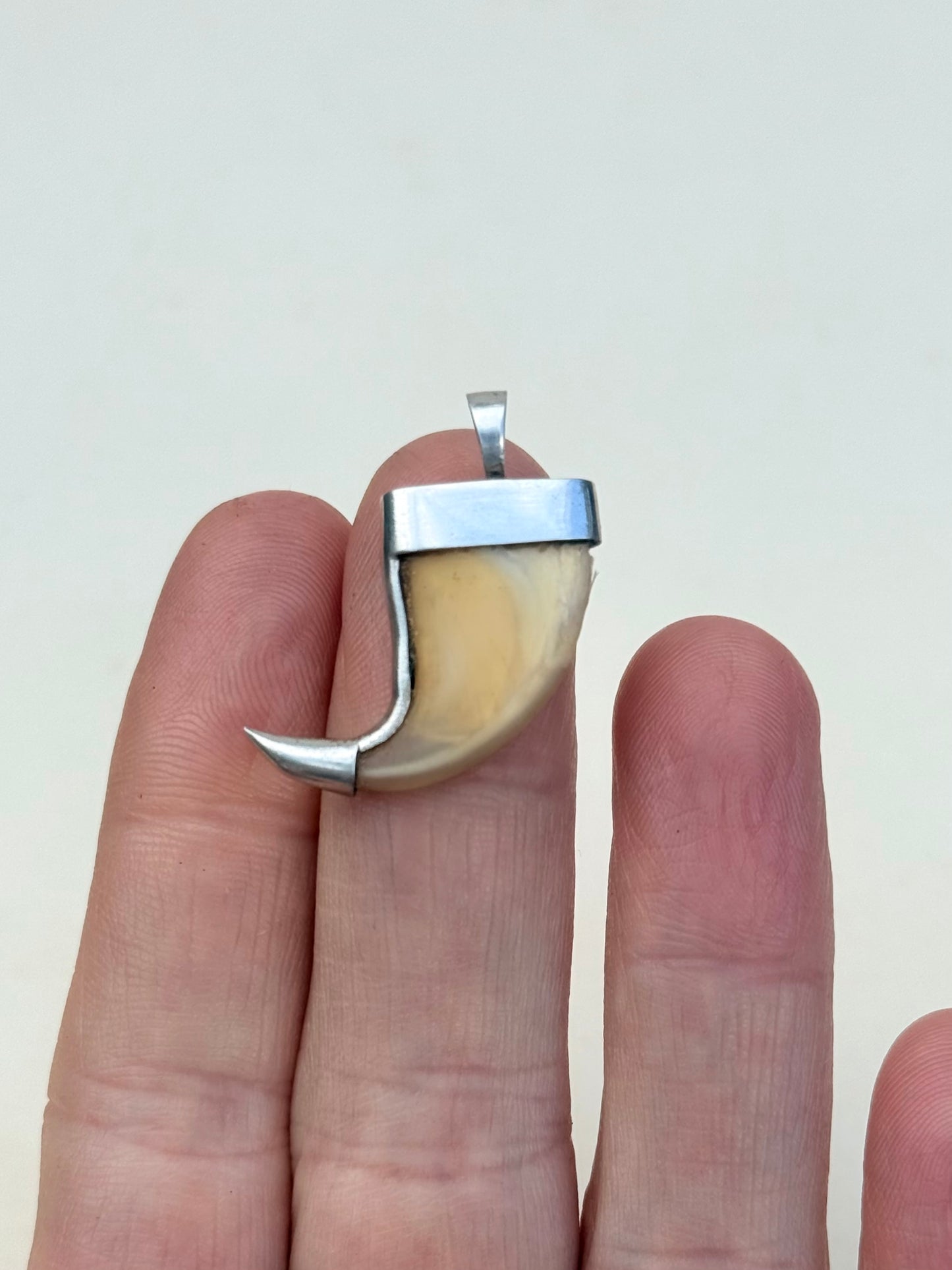 .925 silver Victorian revival lion claw pendant